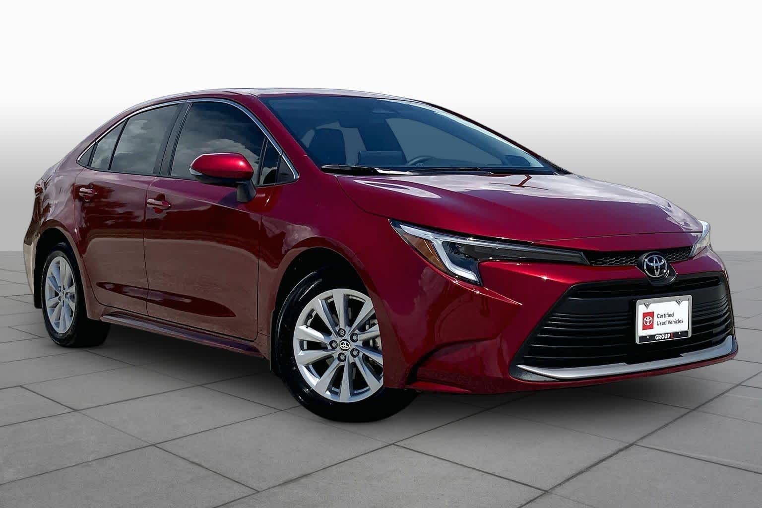 2026 Toyota Corolla Hybrid XLE Ruby Flare Pearl at Team Toyota