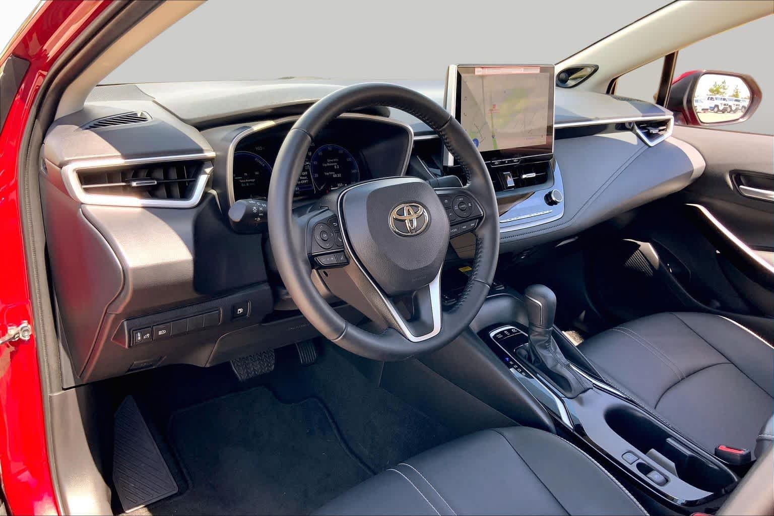 2026 Toyota Corolla Hybrid XLE Ruby Flare Pearl at Team Toyota