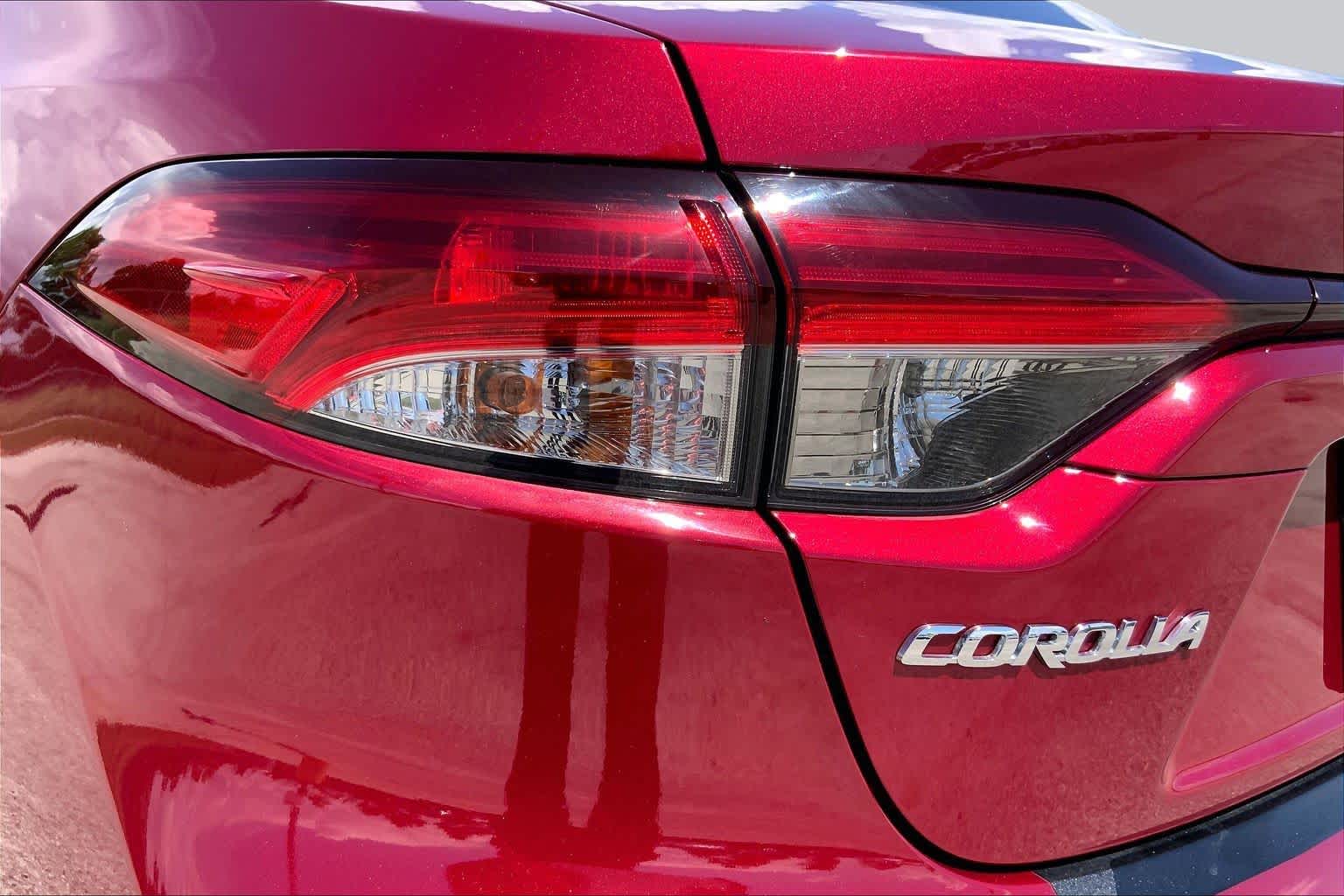 2026 Toyota Corolla Hybrid XLE Ruby Flare Pearl at Team Toyota