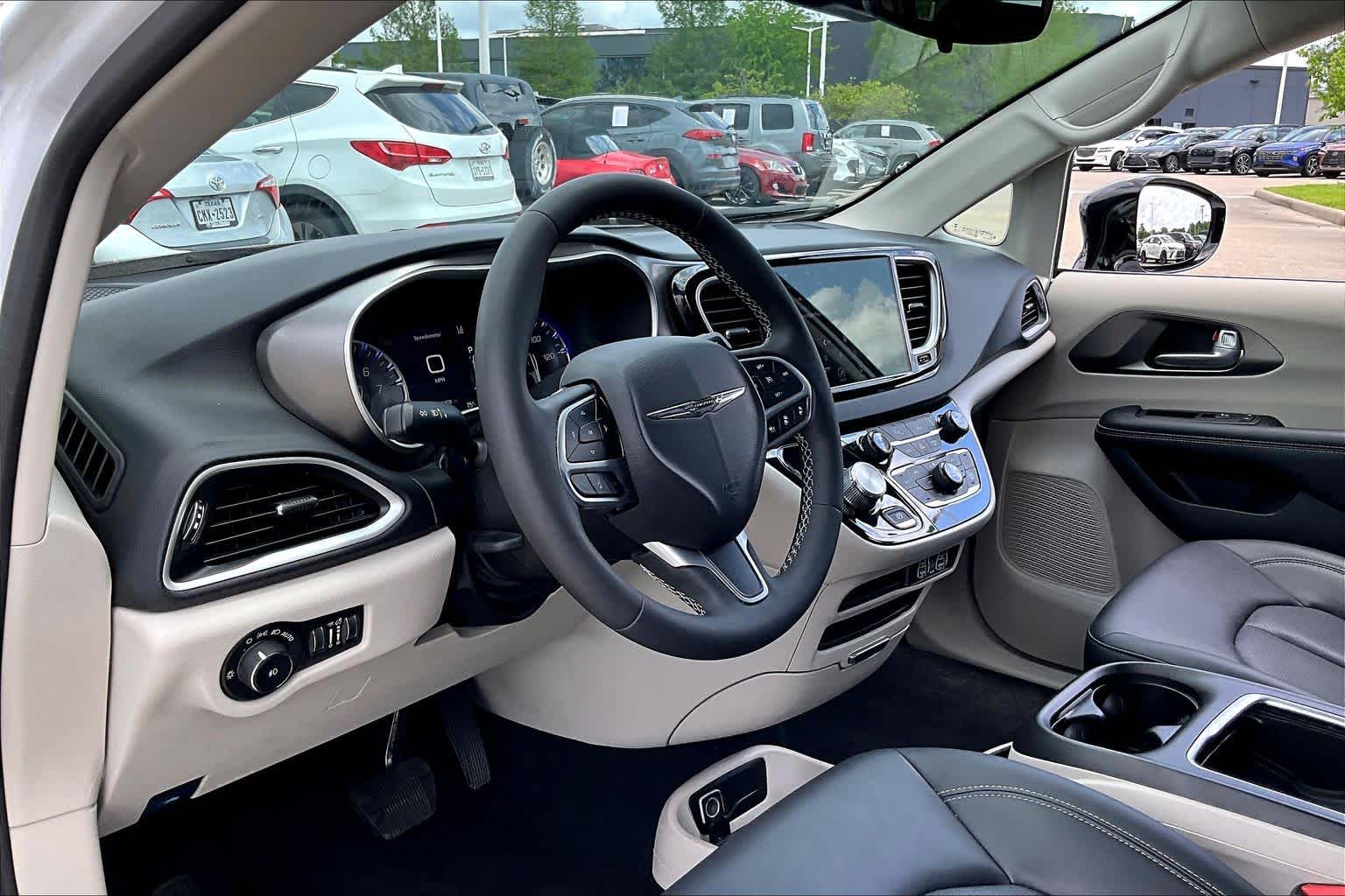 2024 Chrysler Pacifica Touring L Bright White Clearcoat at Tomball Chrysler Dodge Jeep Ram