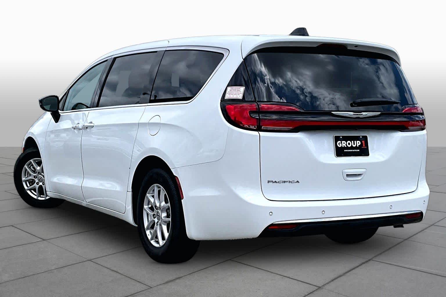 2024 Chrysler Pacifica Touring L Bright White Clearcoat at Tomball Chrysler Dodge Jeep Ram