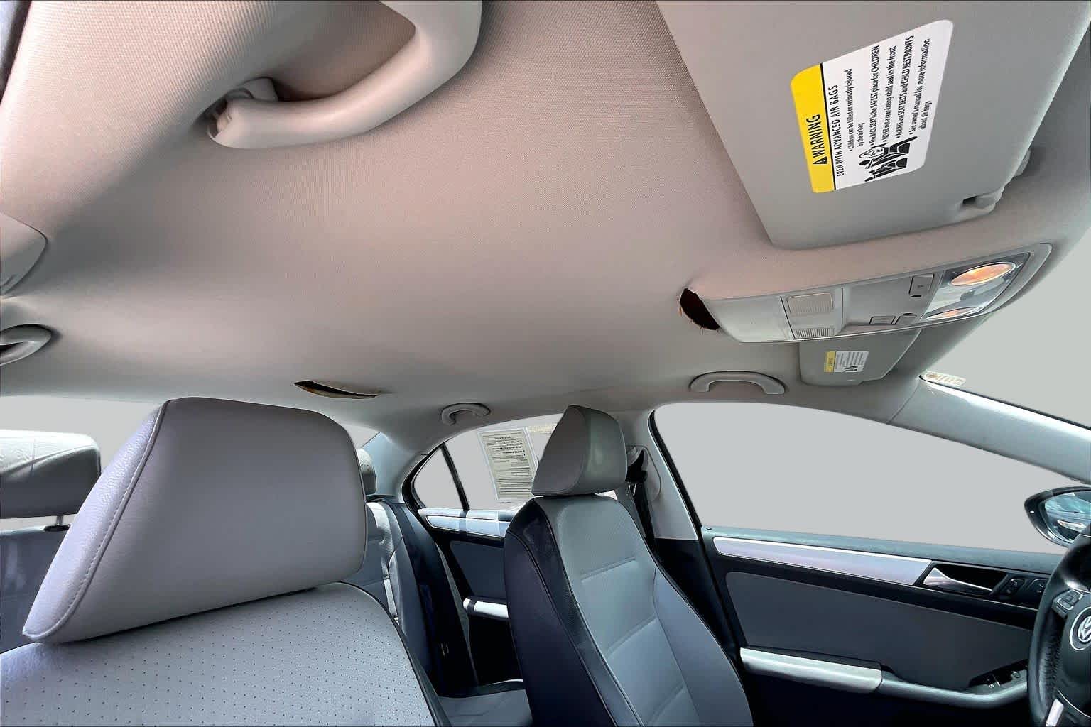 2013 Volkswagen Jetta Hybrid SE Deep Black Metallic at Tomball Ford