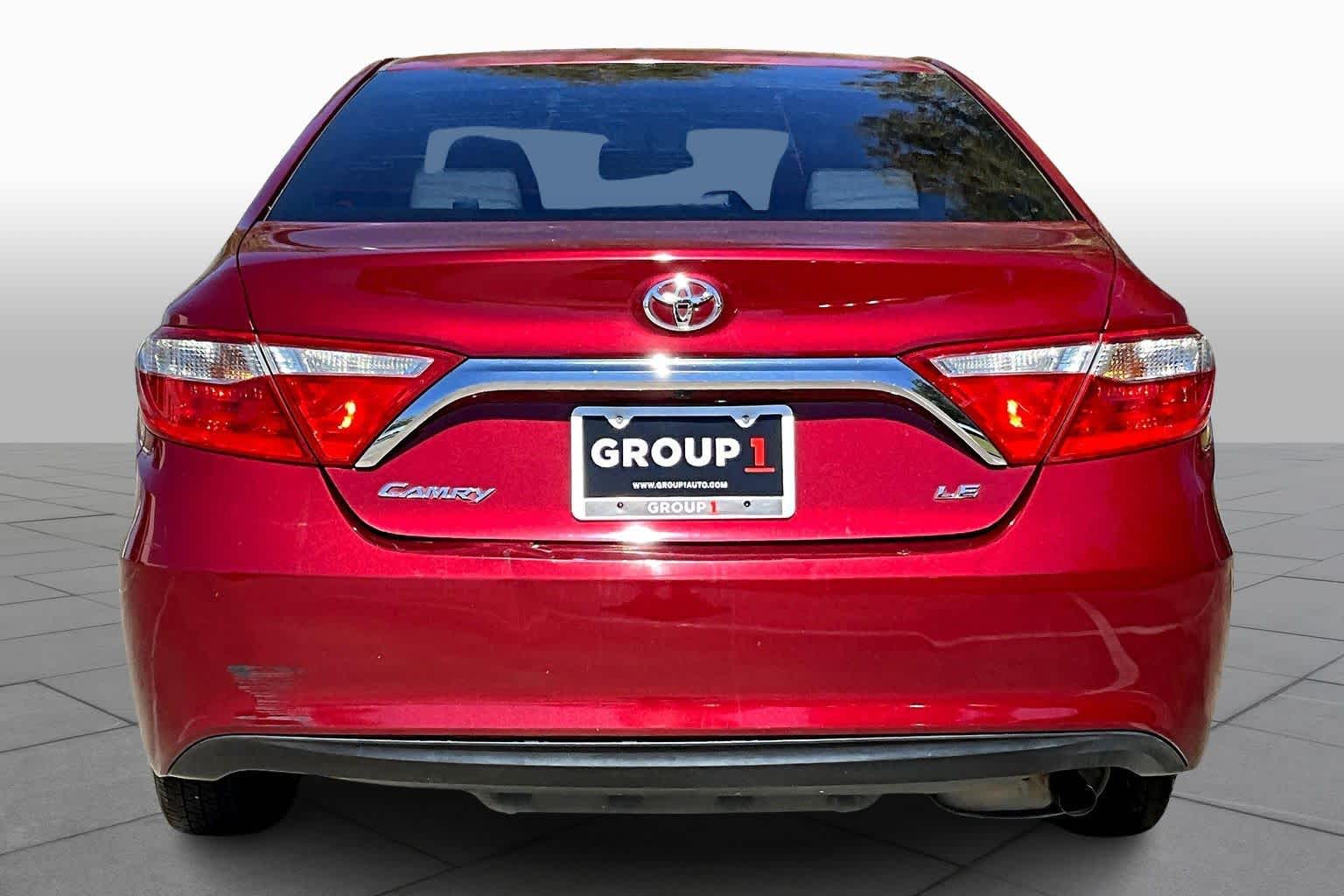 2015 Toyota Camry LE Ruby Flare Pearl at Sterling McCall Lexus