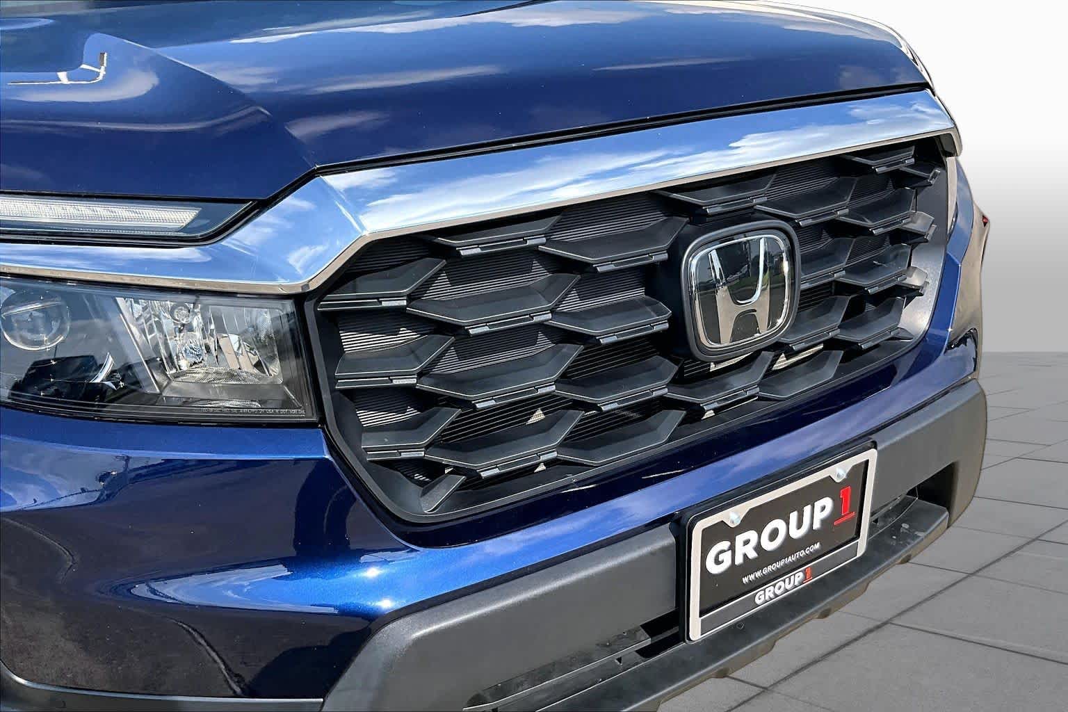 2023 Honda Passport EX-L Obsidian Blue Pearl at Team Toyota