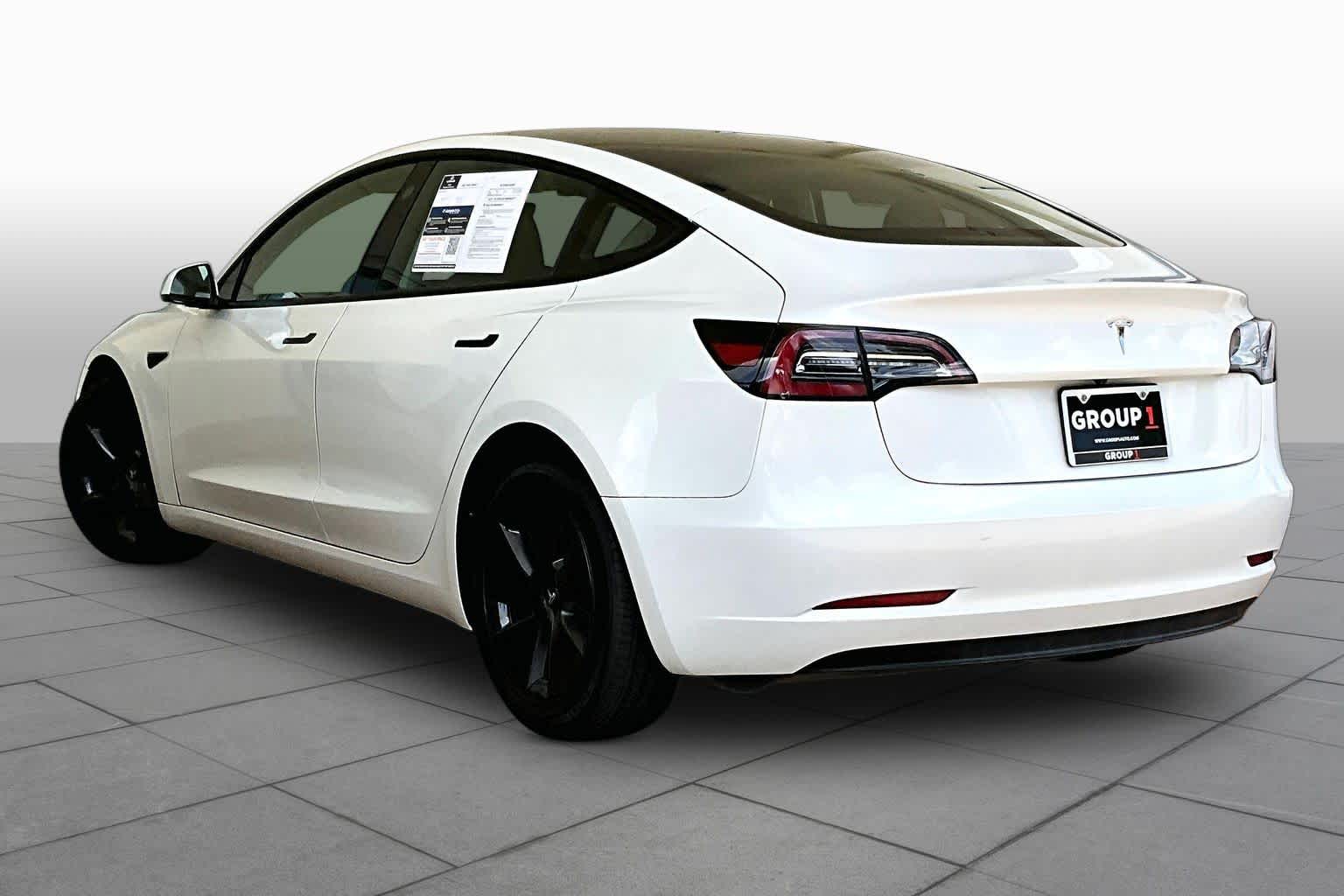 2023 Tesla Model 3  Pearl White Multi-Coat at AutoNation USA Katy