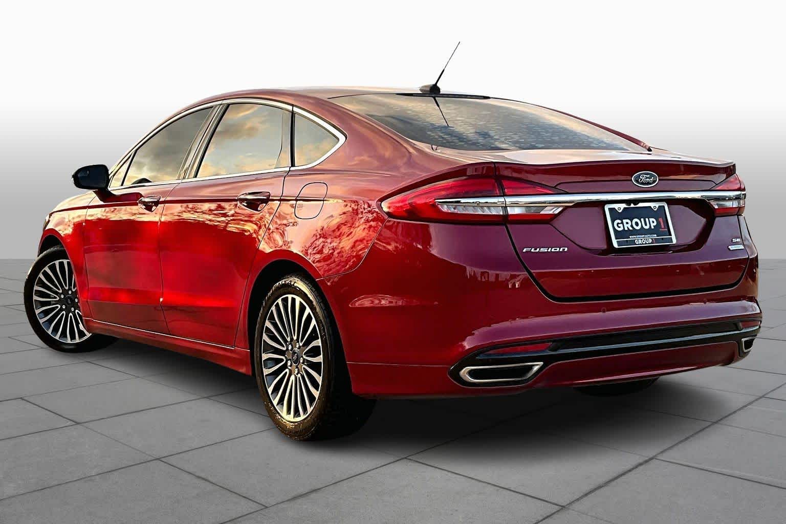 2017 Ford Fusion SE Ruby Red Metallic Tinted Clearcoat at HGreg Houston