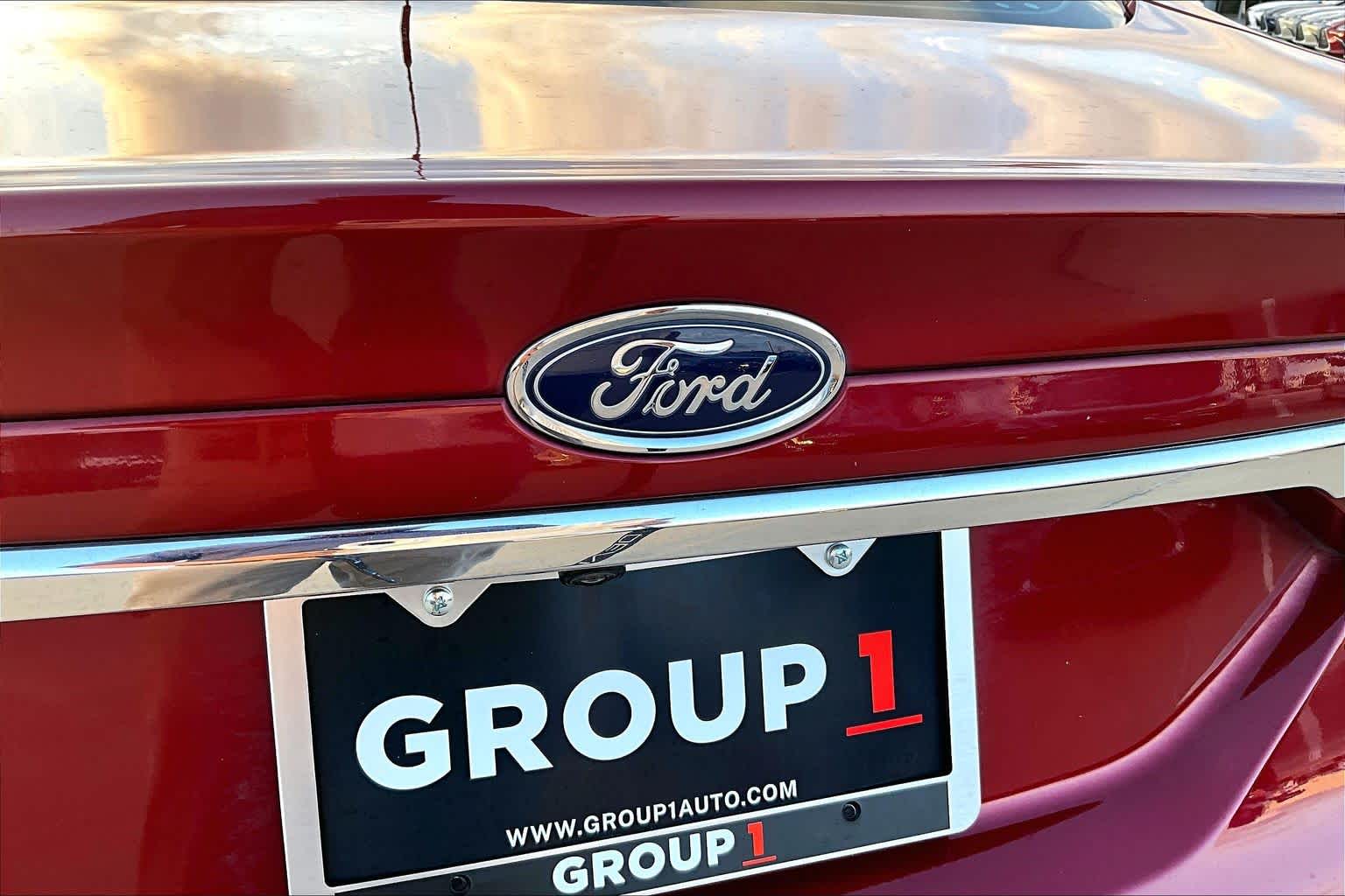 2017 Ford Fusion SE Ruby Red Metallic Tinted Clearcoat at HGreg Houston