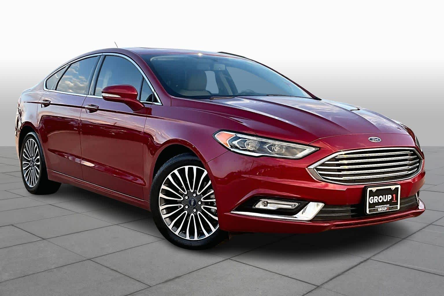 2017 Ford Fusion SE Ruby Red Metallic Tinted Clearcoat at HGreg Houston