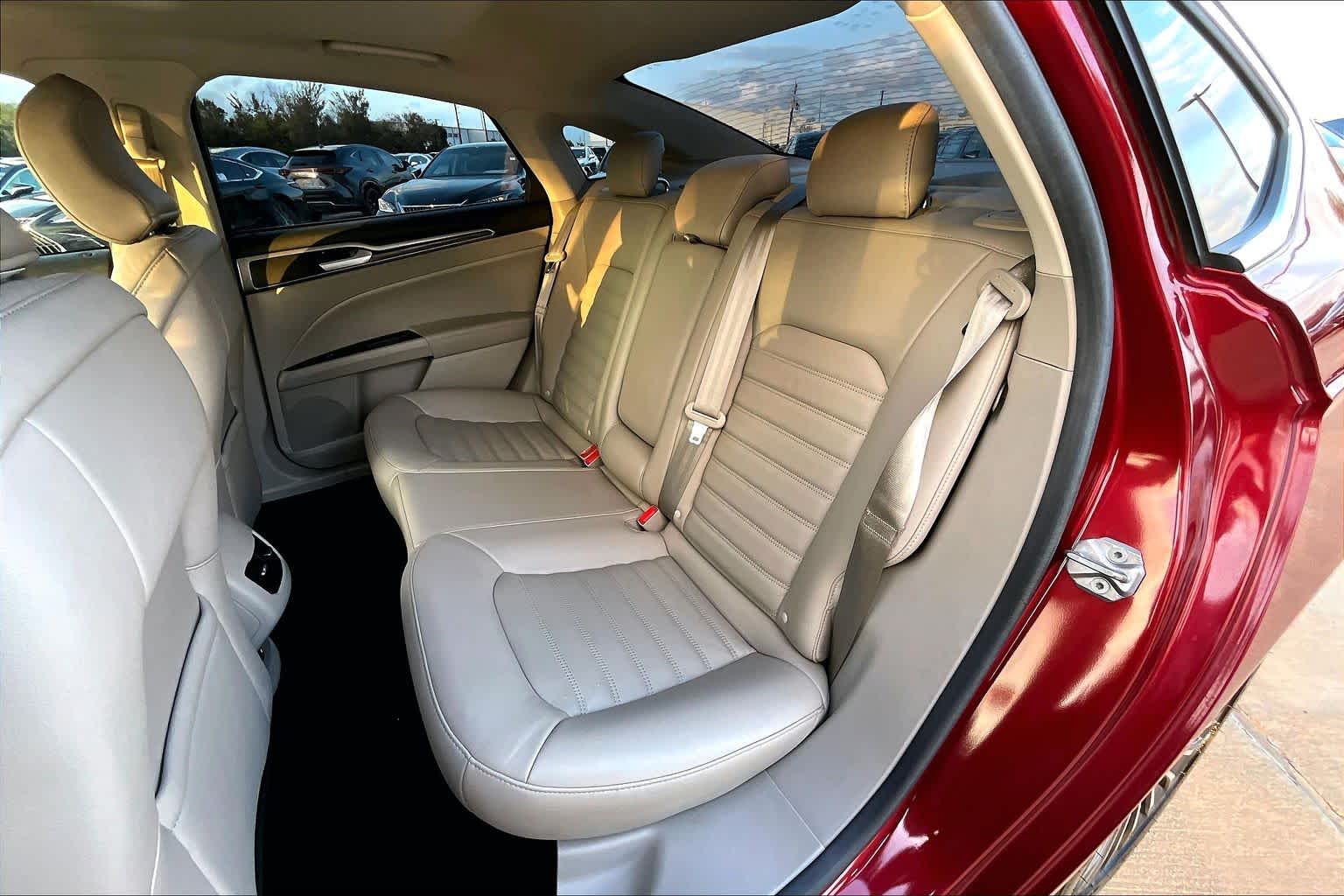 2017 Ford Fusion SE Ruby Red Metallic Tinted Clearcoat at HGreg Houston