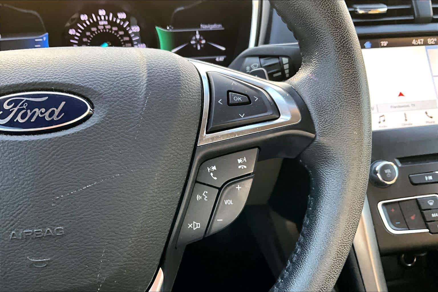 2017 Ford Fusion SE Ruby Red Metallic Tinted Clearcoat at HGreg Houston