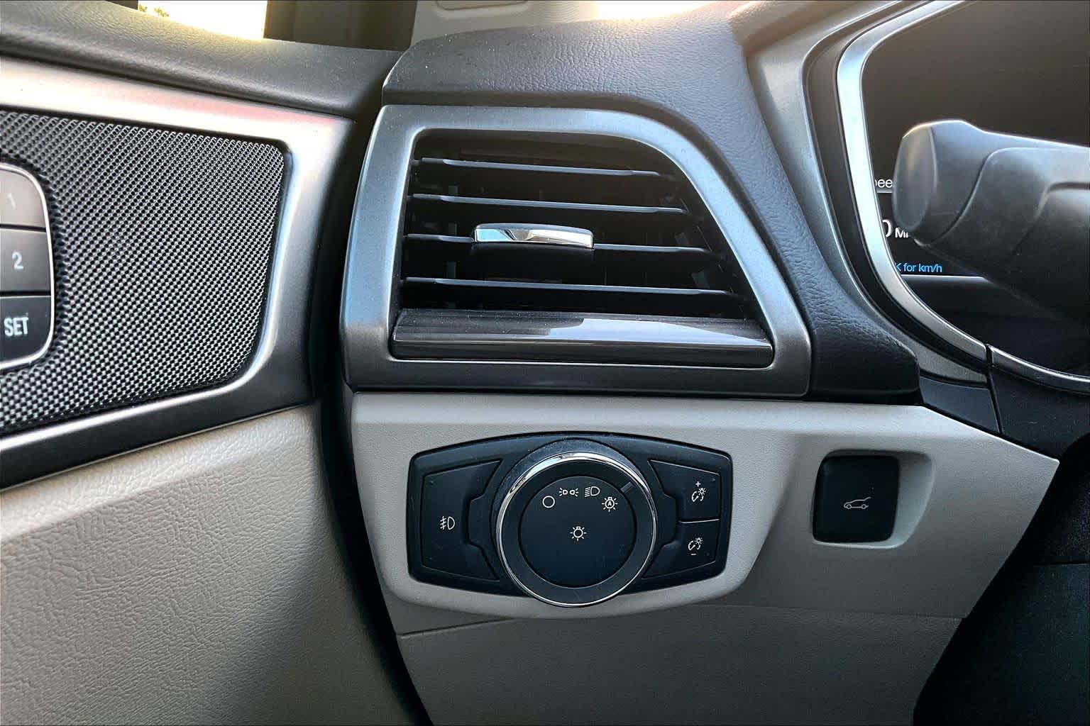 2017 Ford Fusion SE Ruby Red Metallic Tinted Clearcoat at HGreg Houston