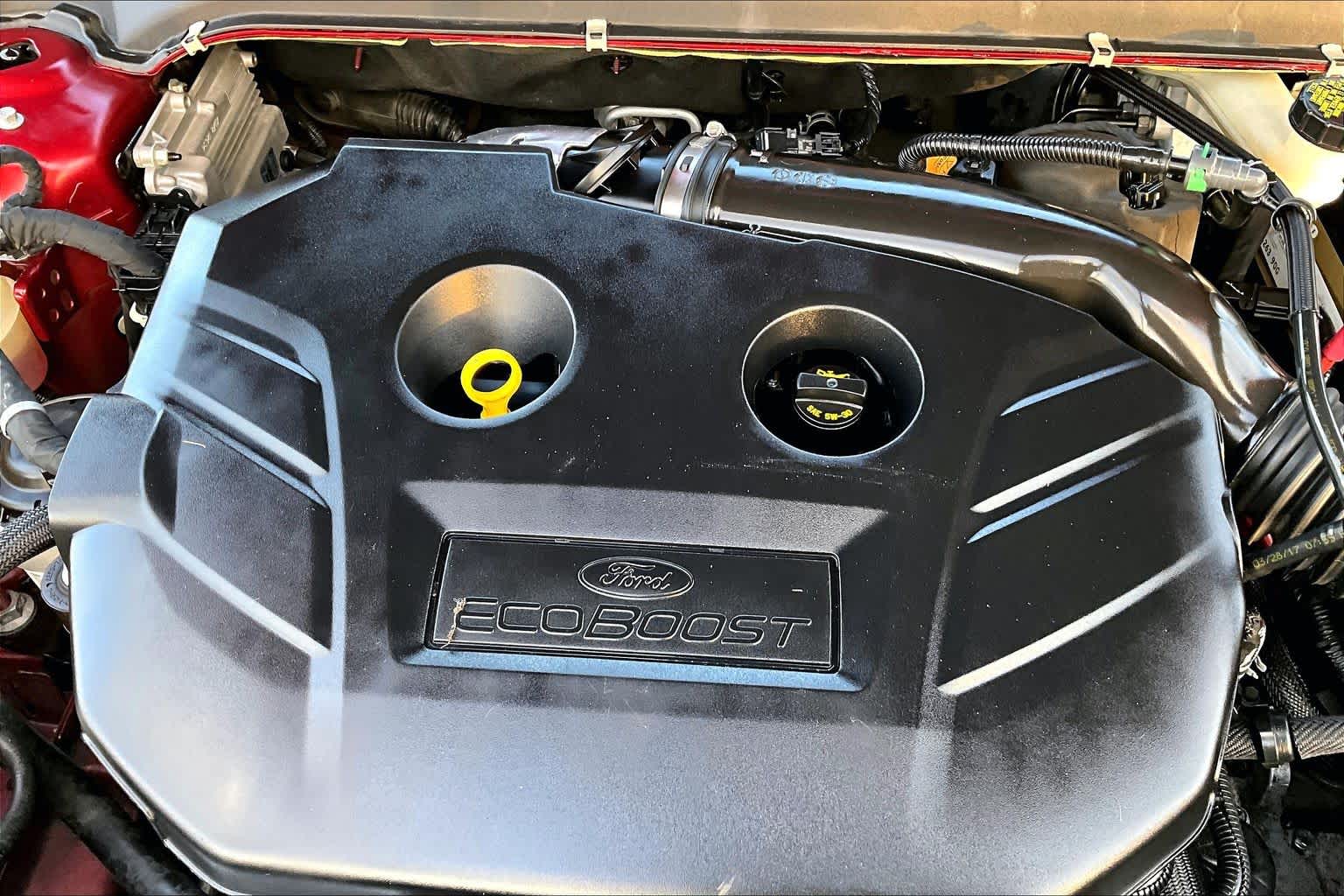 2017 Ford Fusion SE Ruby Red Metallic Tinted Clearcoat at HGreg Houston