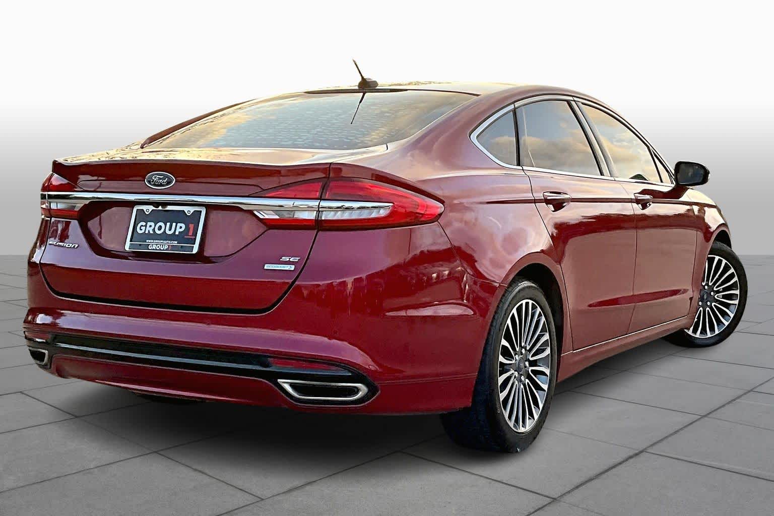 2017 Ford Fusion SE Ruby Red Metallic Tinted Clearcoat at HGreg Houston