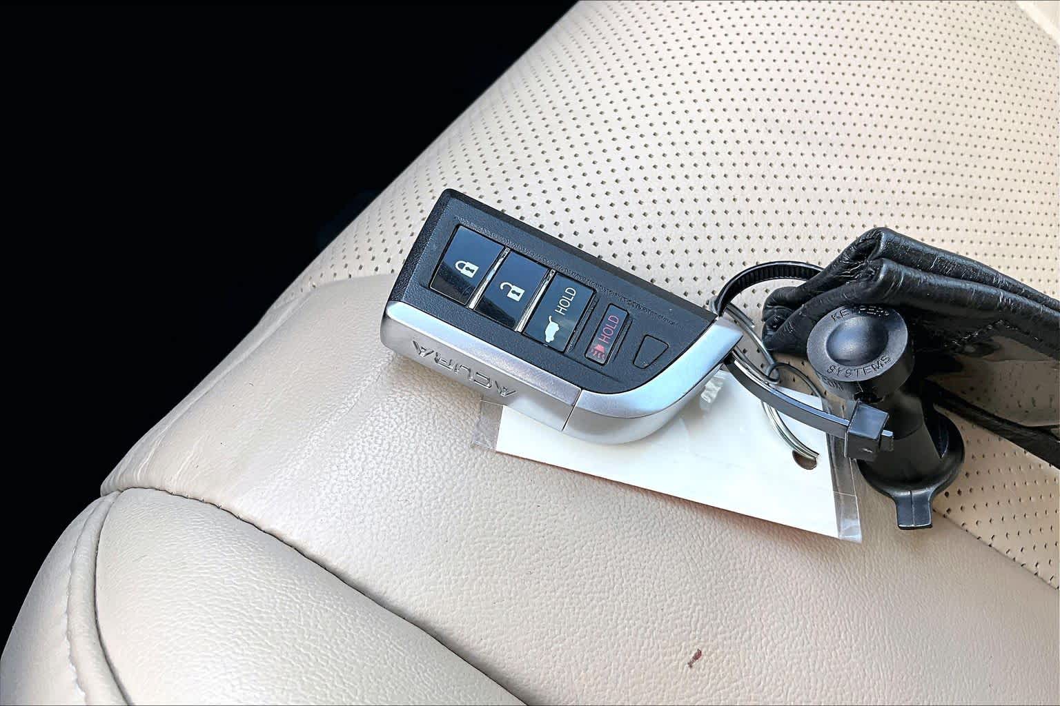 2024 Acura MDX w/Technology Package Platinum White Pearl at AutoNation Chrysler Jeep Dodge Ram Spring