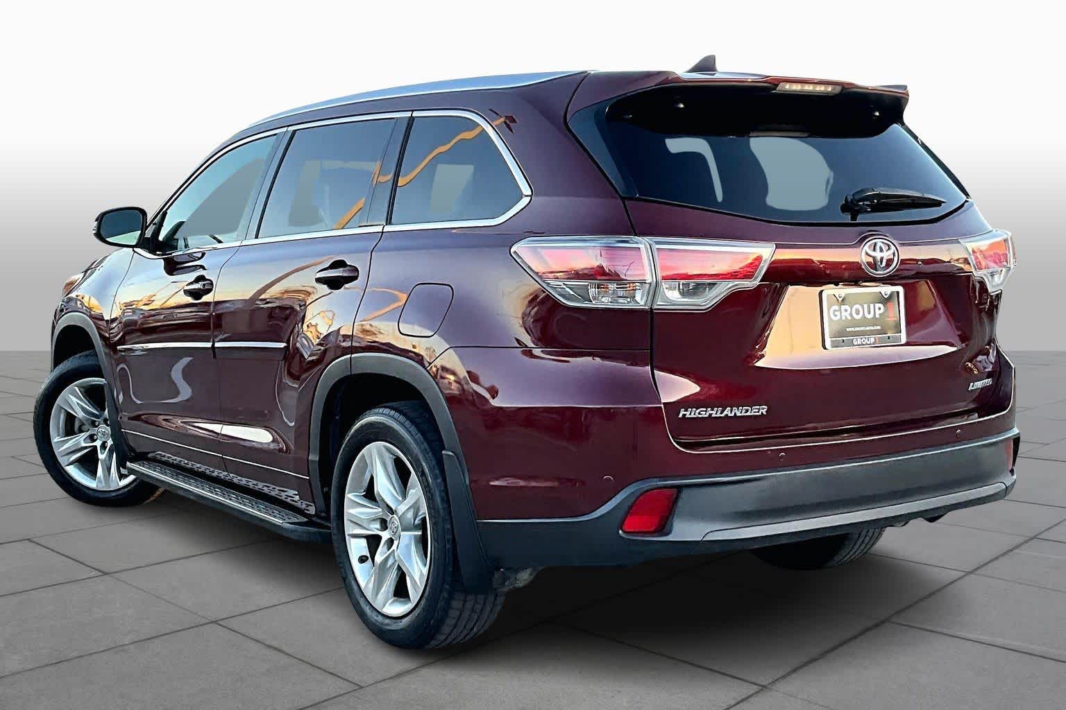 2015 Toyota Highlander Limited Ooh La La Rouge Mica at AutoNation Ford Gulf Fwy