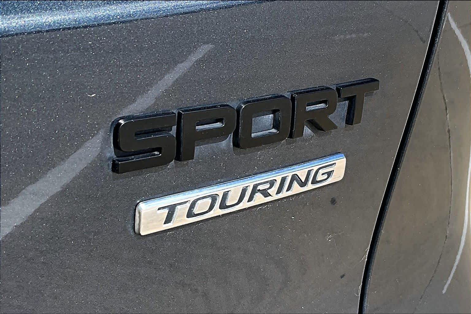 2024 Honda CR-V Hybrid Sport Touring Meteorite Gray Metallic at Honda of Clear Lake
