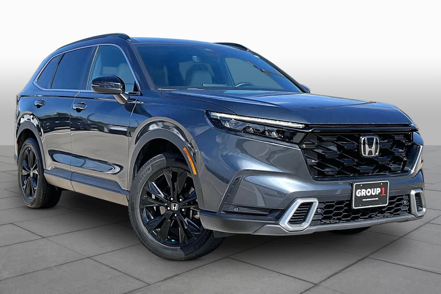 2024 Honda CR-V Hybrid Sport Touring Meteorite Gray Metallic at Honda of Clear Lake