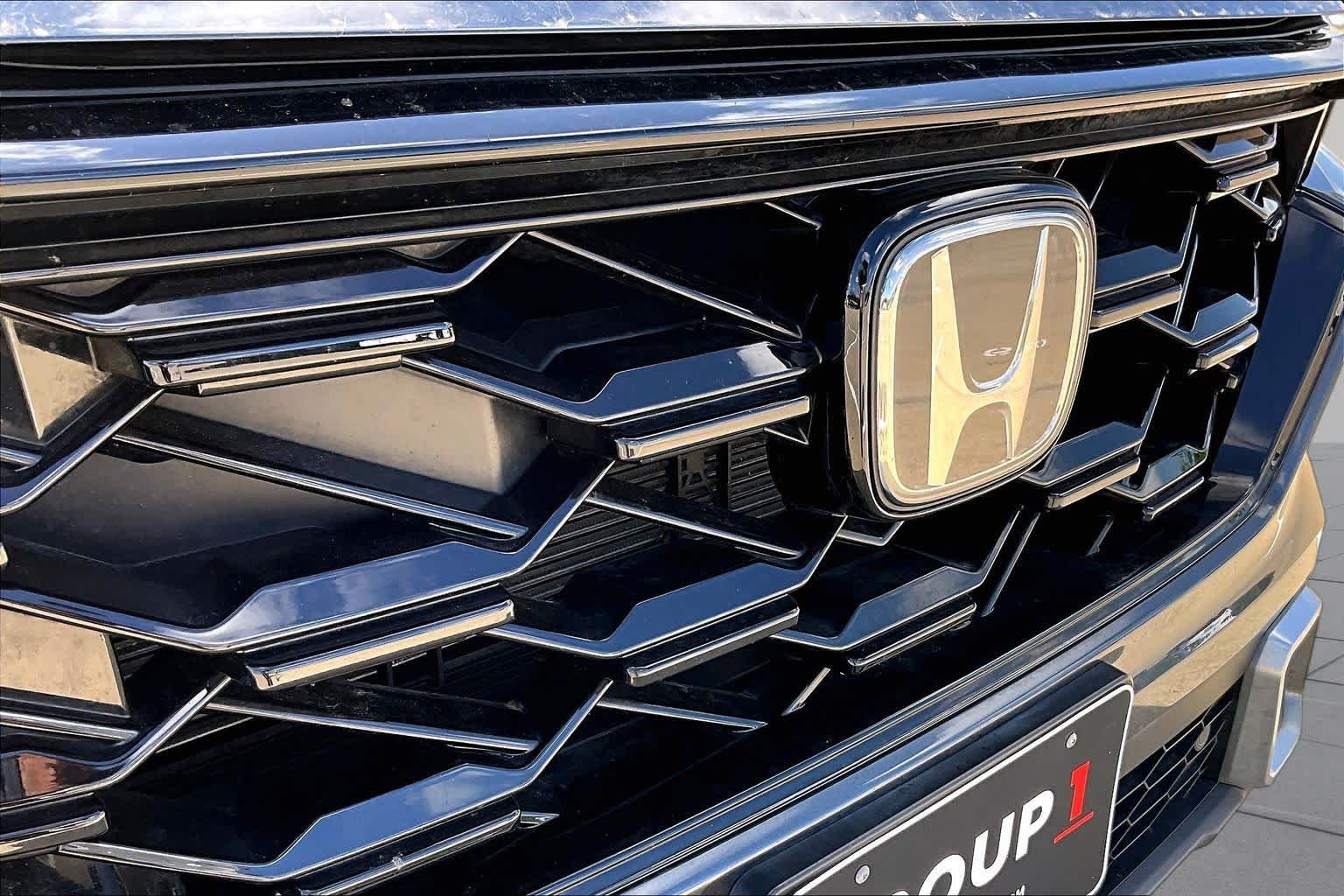 2024 Honda CR-V Hybrid Sport Touring Meteorite Gray Metallic at Honda of Clear Lake