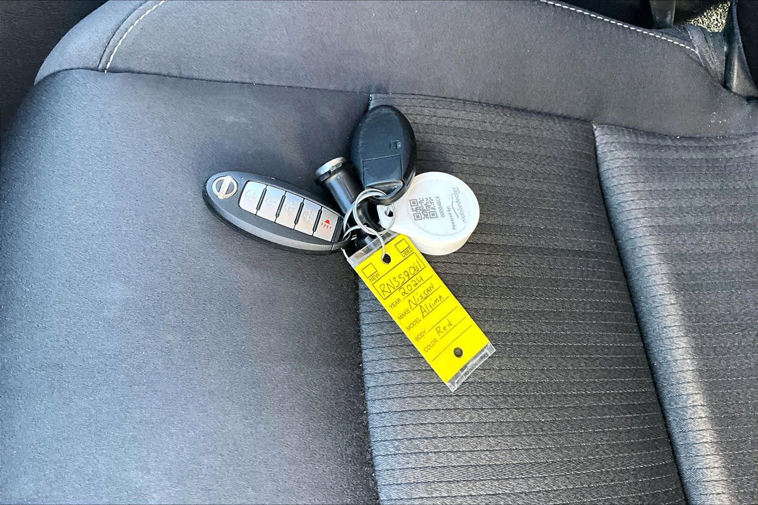 2024 Nissan Altima 2.5 SV Garnet Pearl Metallic at AutoNation Ford Gulf Fwy