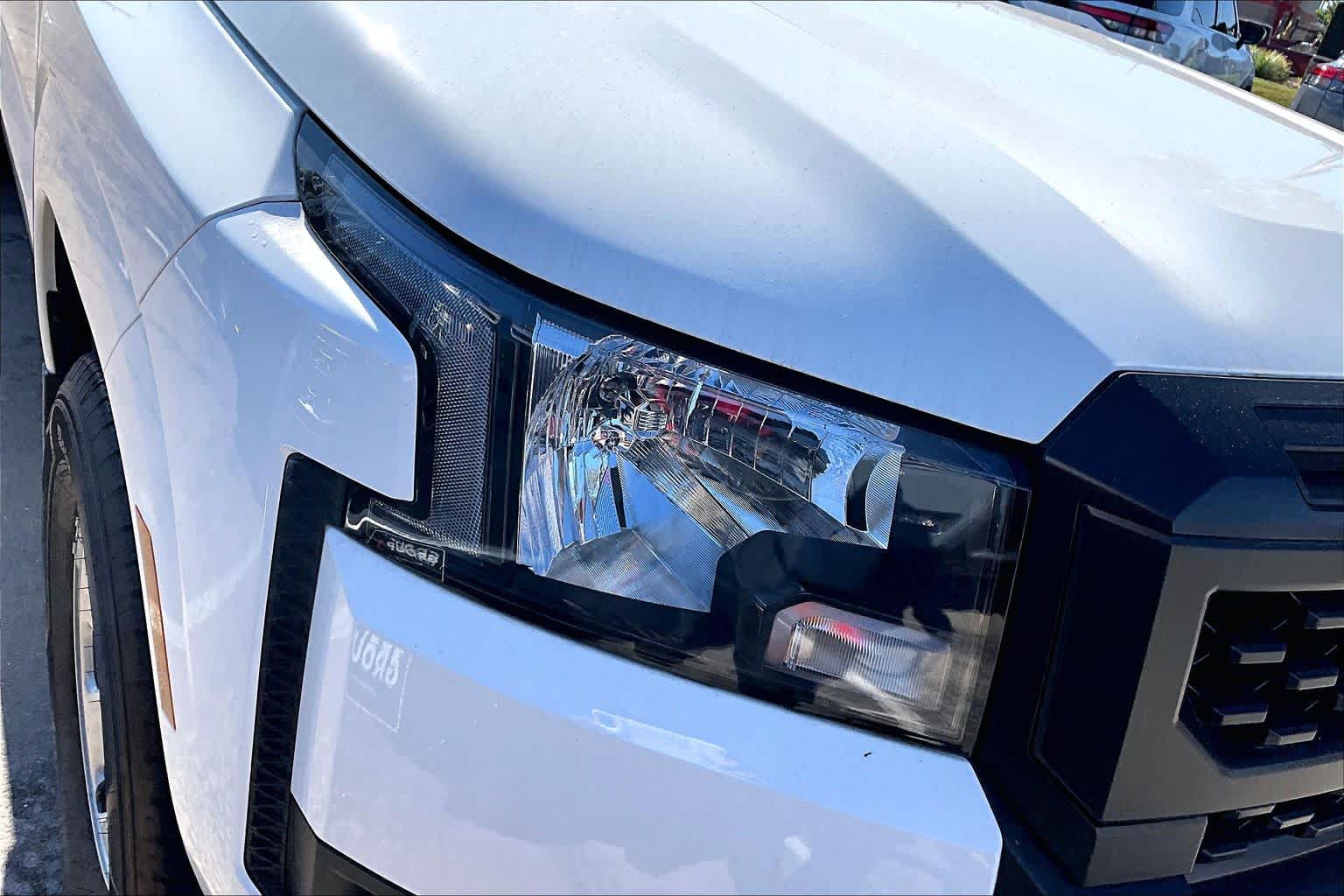 2025 Nissan Frontier S Glacier White at Tomball Ford