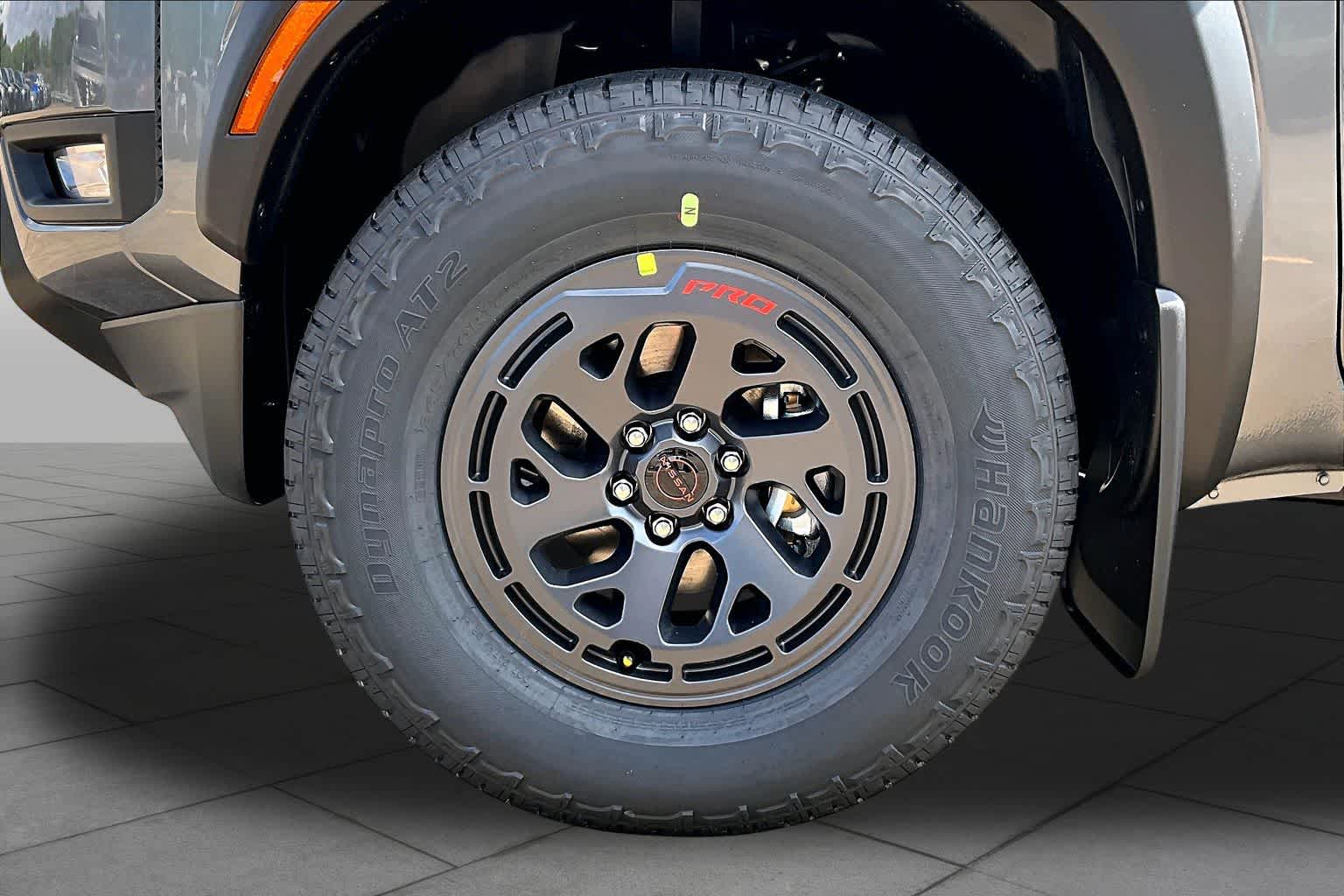 2026 Nissan Frontier PRO-X Gun Metallic at Sterling McCall Nissan