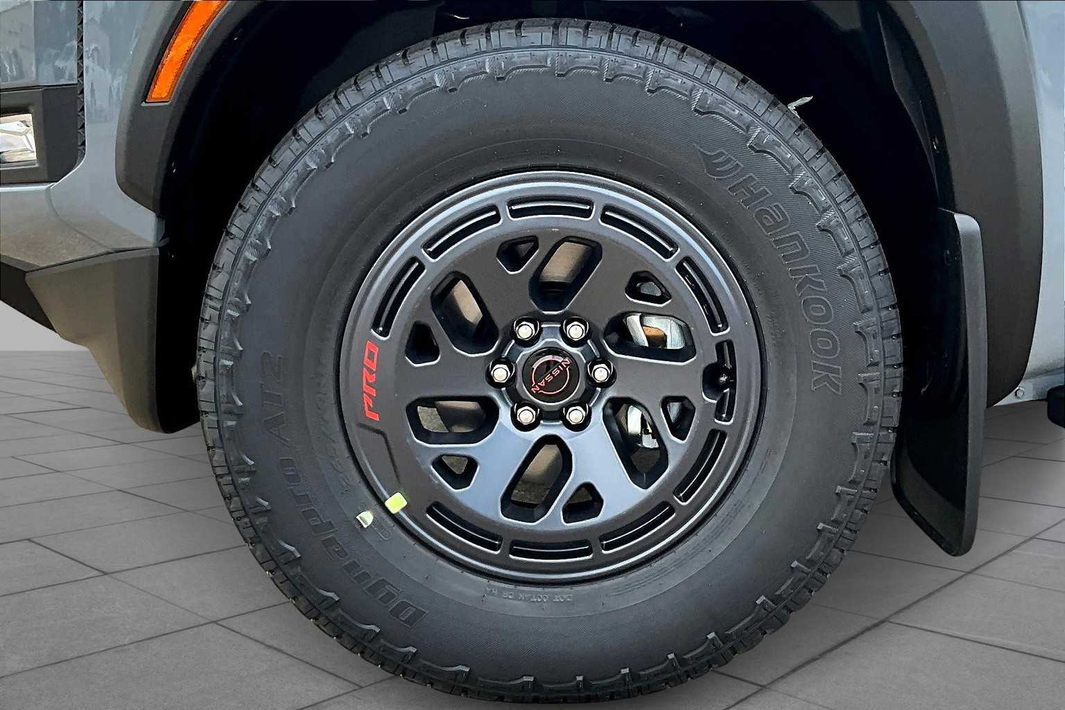 2026 Nissan Frontier PRO-X Boulder Gray Pearl at Sterling McCall Nissan