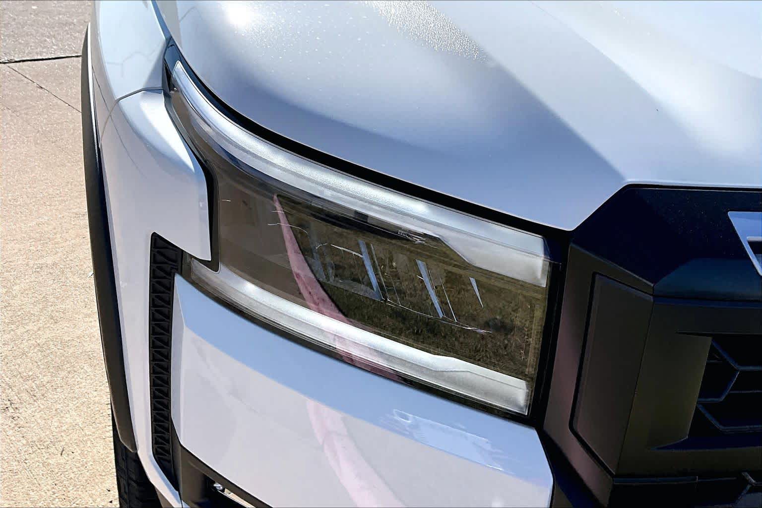 2026 Nissan Frontier PRO-X Glacier White at Sterling McCall Nissan