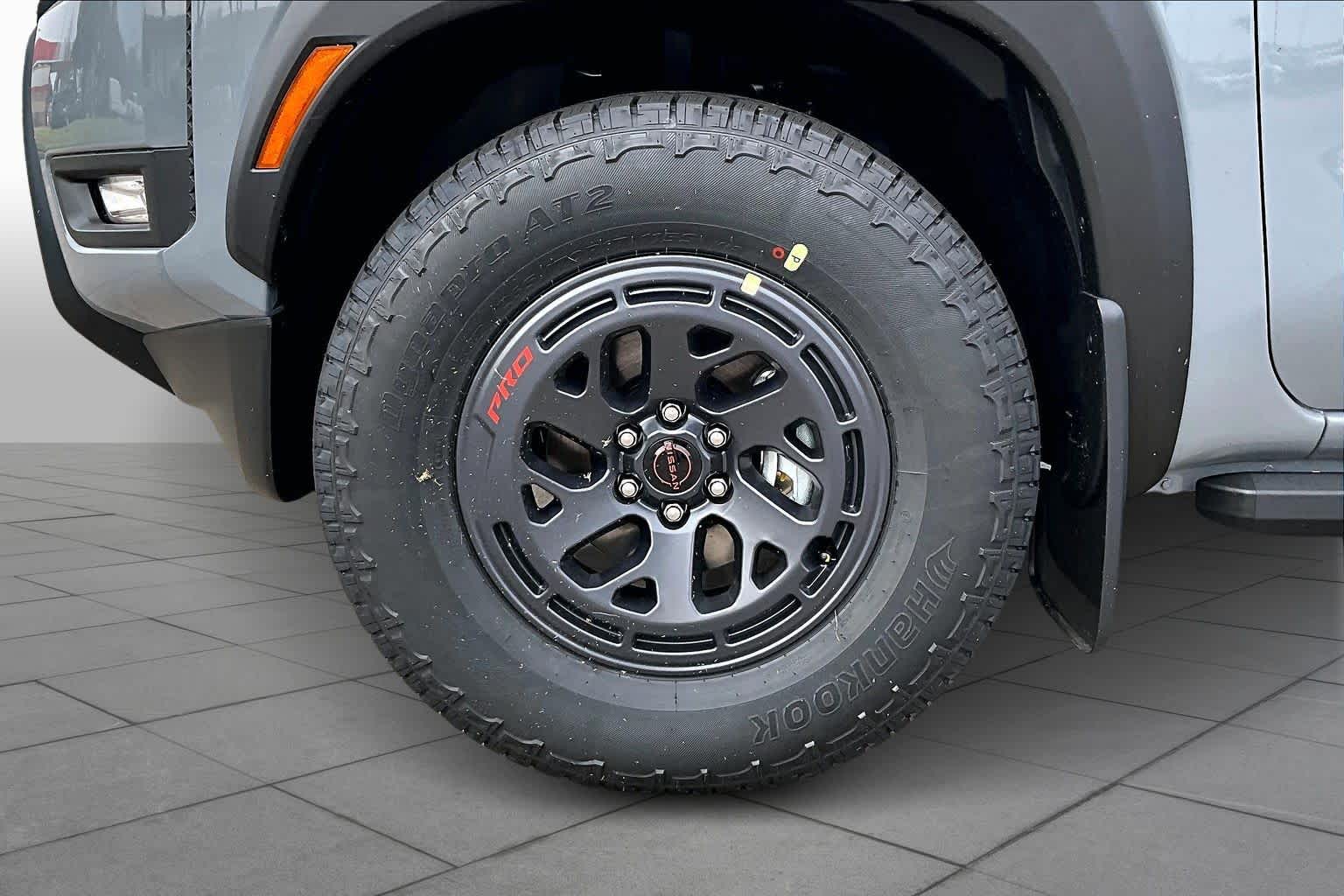 2026 Nissan Frontier PRO-X Boulder Gray Pearl at Sterling McCall Nissan