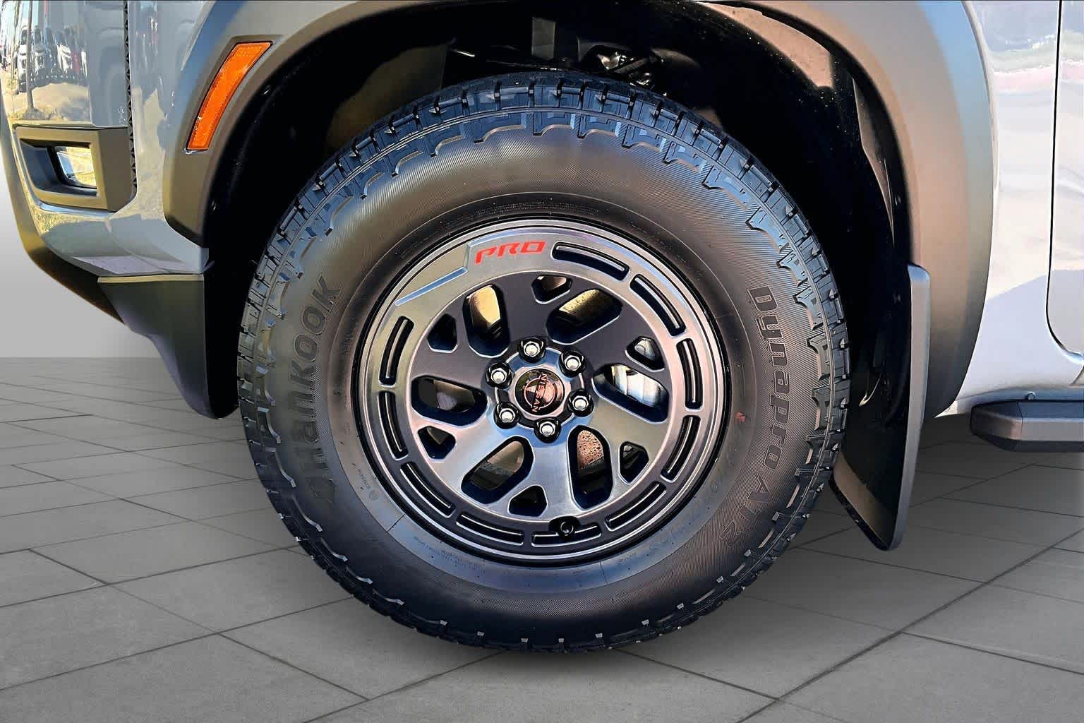 2026 Nissan Frontier PRO-X Boulder Gray Pearl at Sterling McCall Nissan