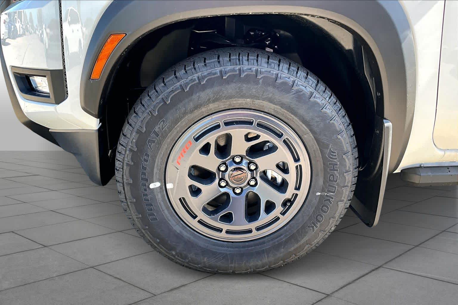 2026 Nissan Frontier PRO-X Glacier White at Sterling McCall Nissan