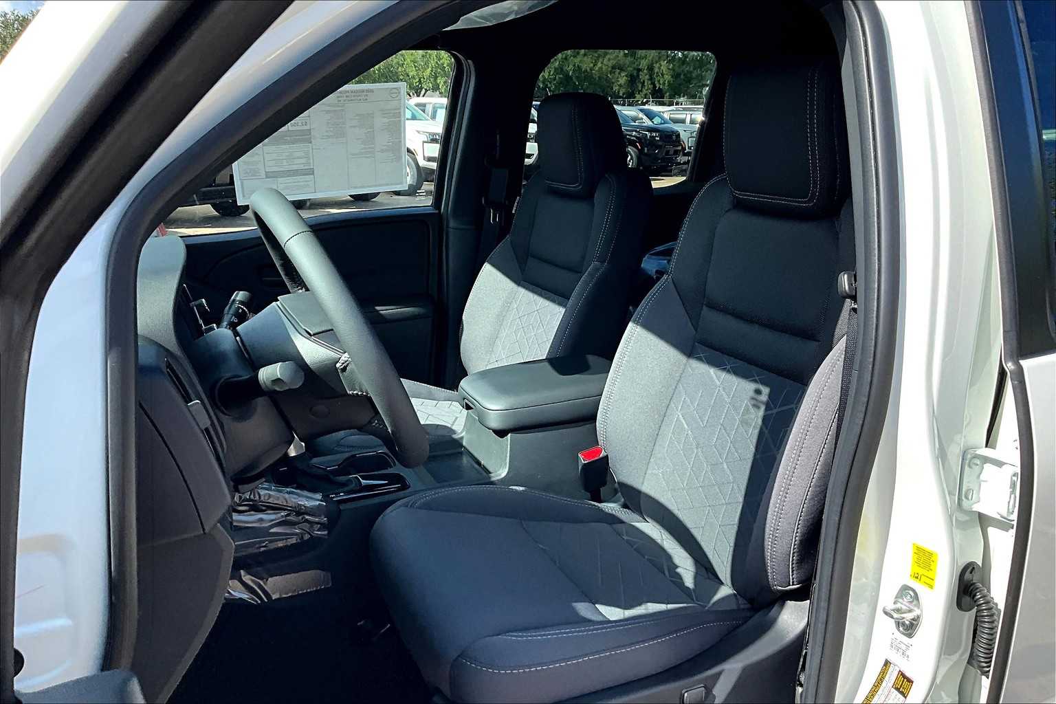 2026 Nissan Frontier SV Glacier White at Sterling McCall Nissan