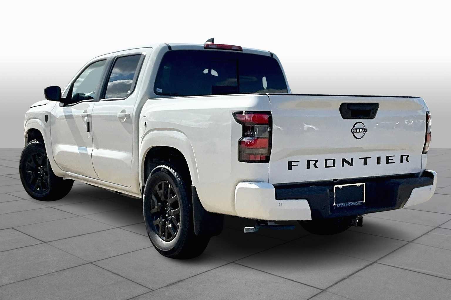 2026 Nissan Frontier SV Glacier White at Sterling McCall Nissan