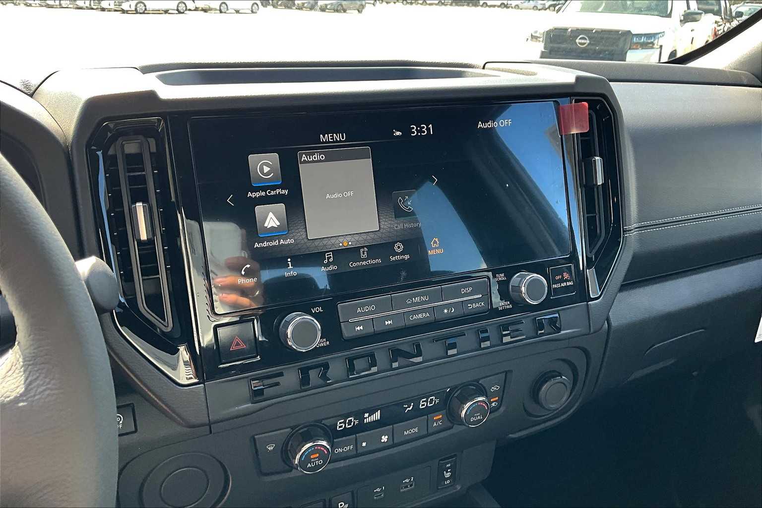 2026 Nissan Frontier SV Glacier White at Sterling McCall Nissan