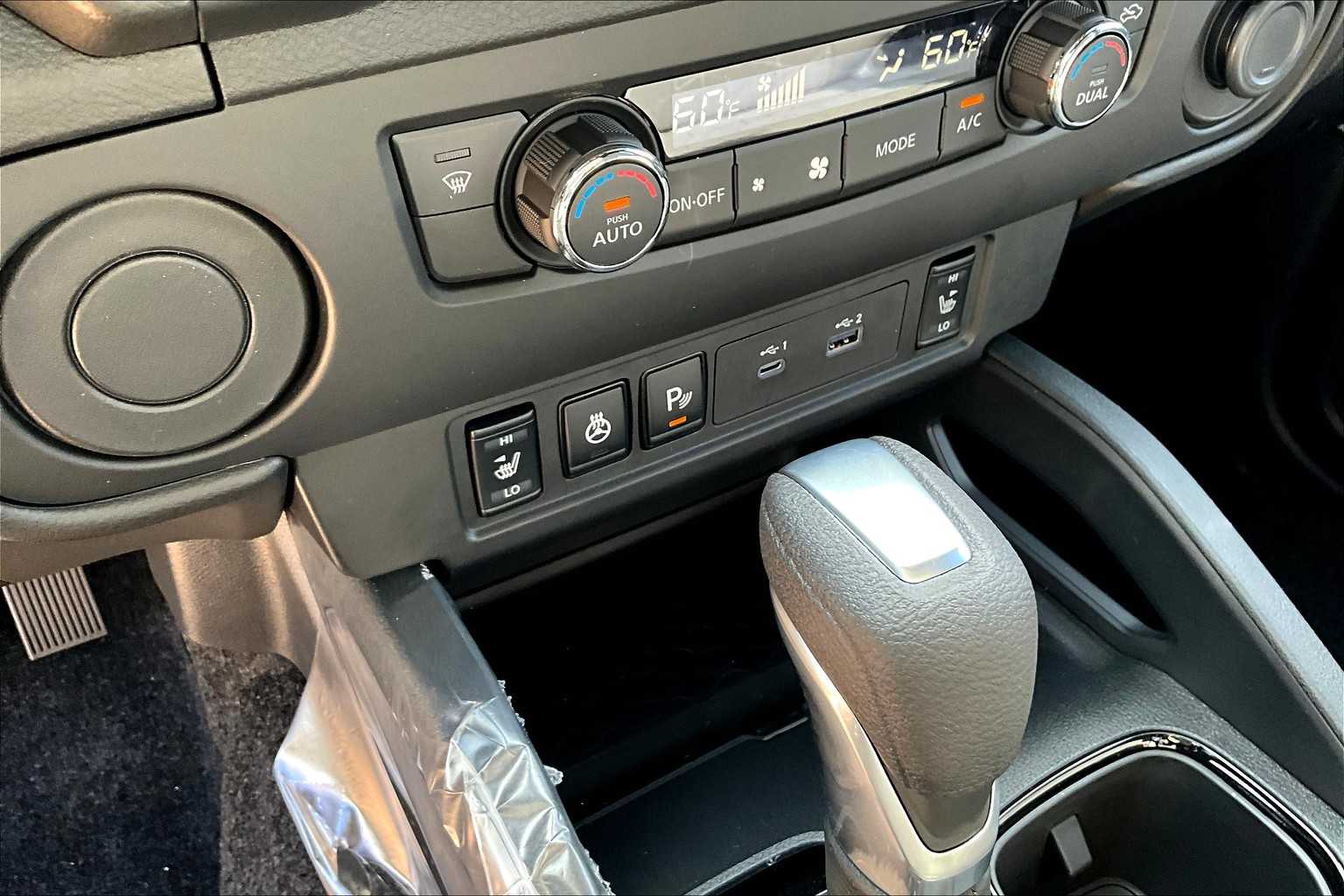 2026 Nissan Frontier SV Glacier White at Sterling McCall Nissan