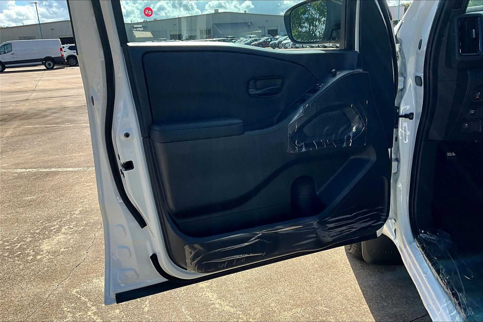 2026 Nissan Frontier SV Glacier White at Sterling McCall Nissan