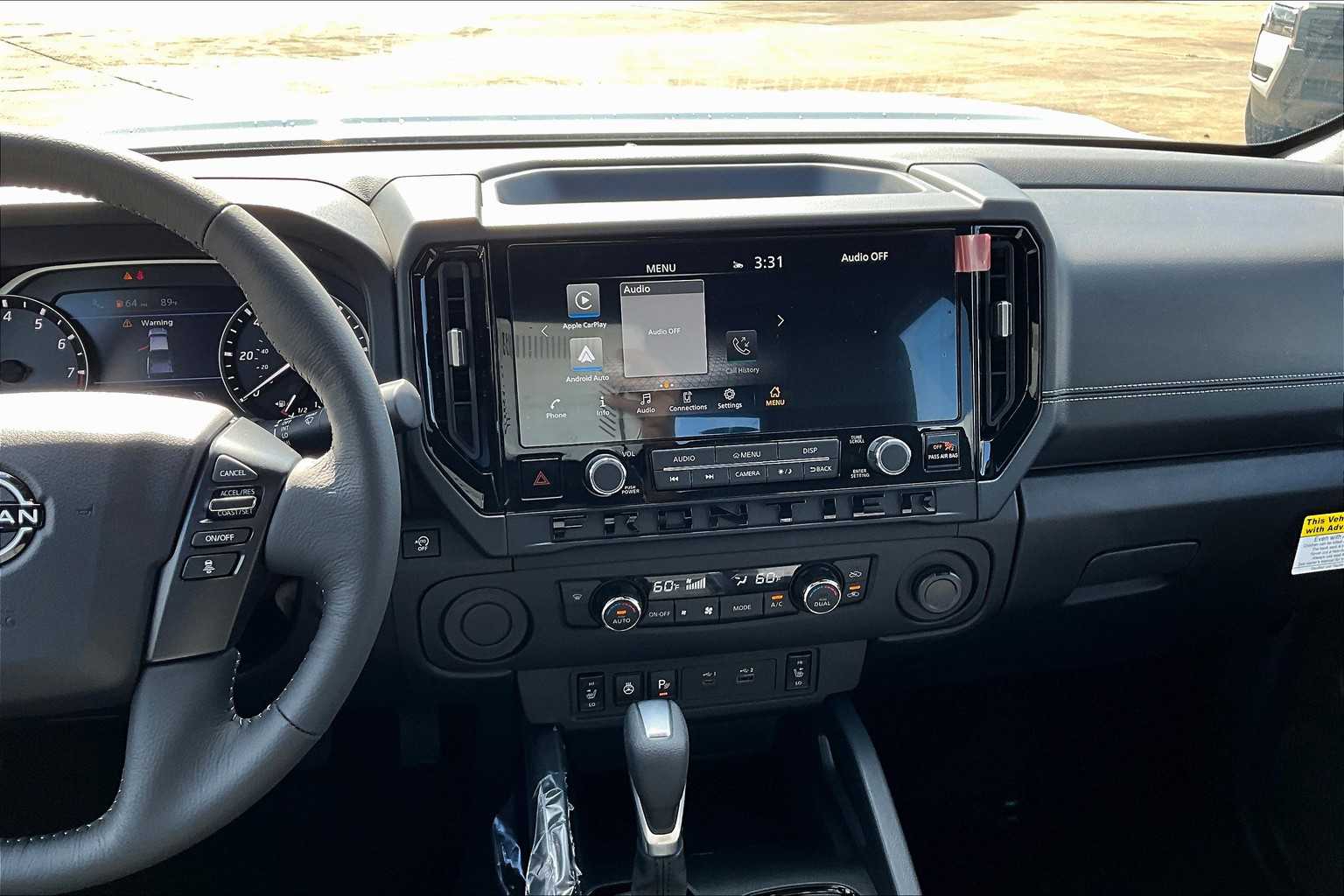 2026 Nissan Frontier SV Glacier White at Sterling McCall Nissan