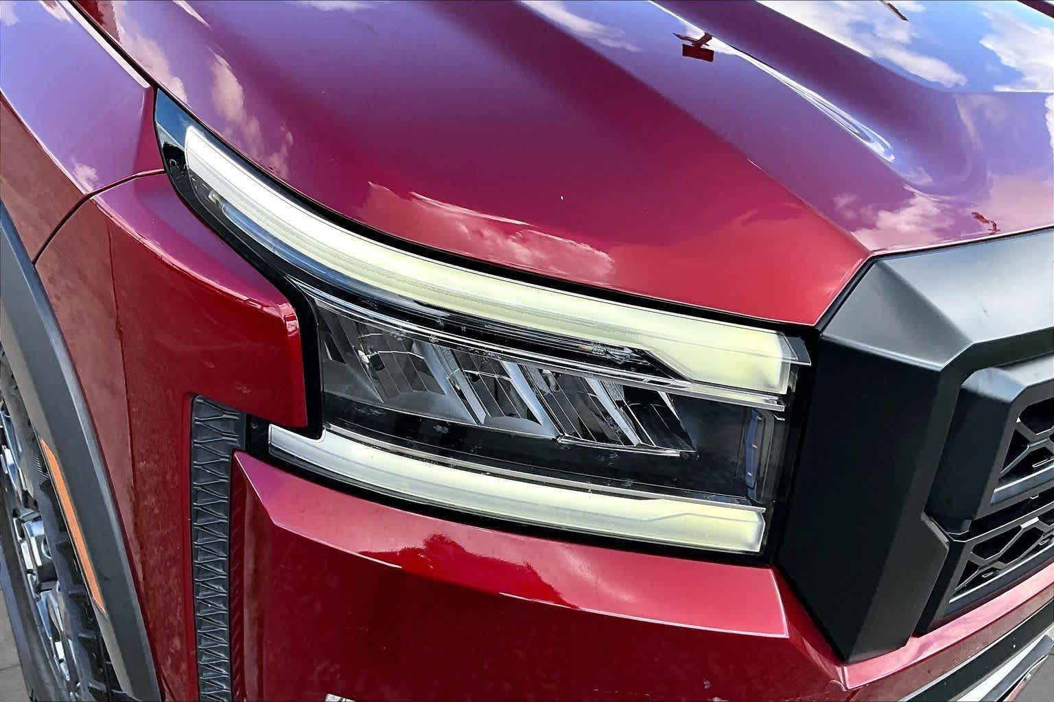 2024 Nissan Frontier PRO-4X Cardinal Red Metallic Tricoat at AutoNation Toyota Gulf Fwy