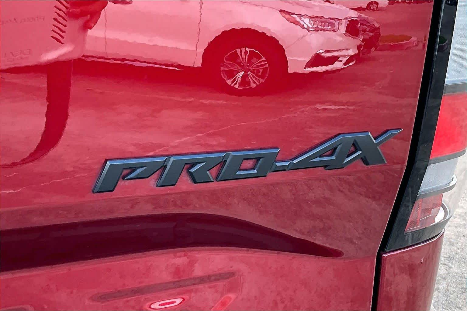 2024 Nissan Frontier PRO-4X Cardinal Red Metallic Tricoat at AutoNation Toyota Gulf Fwy