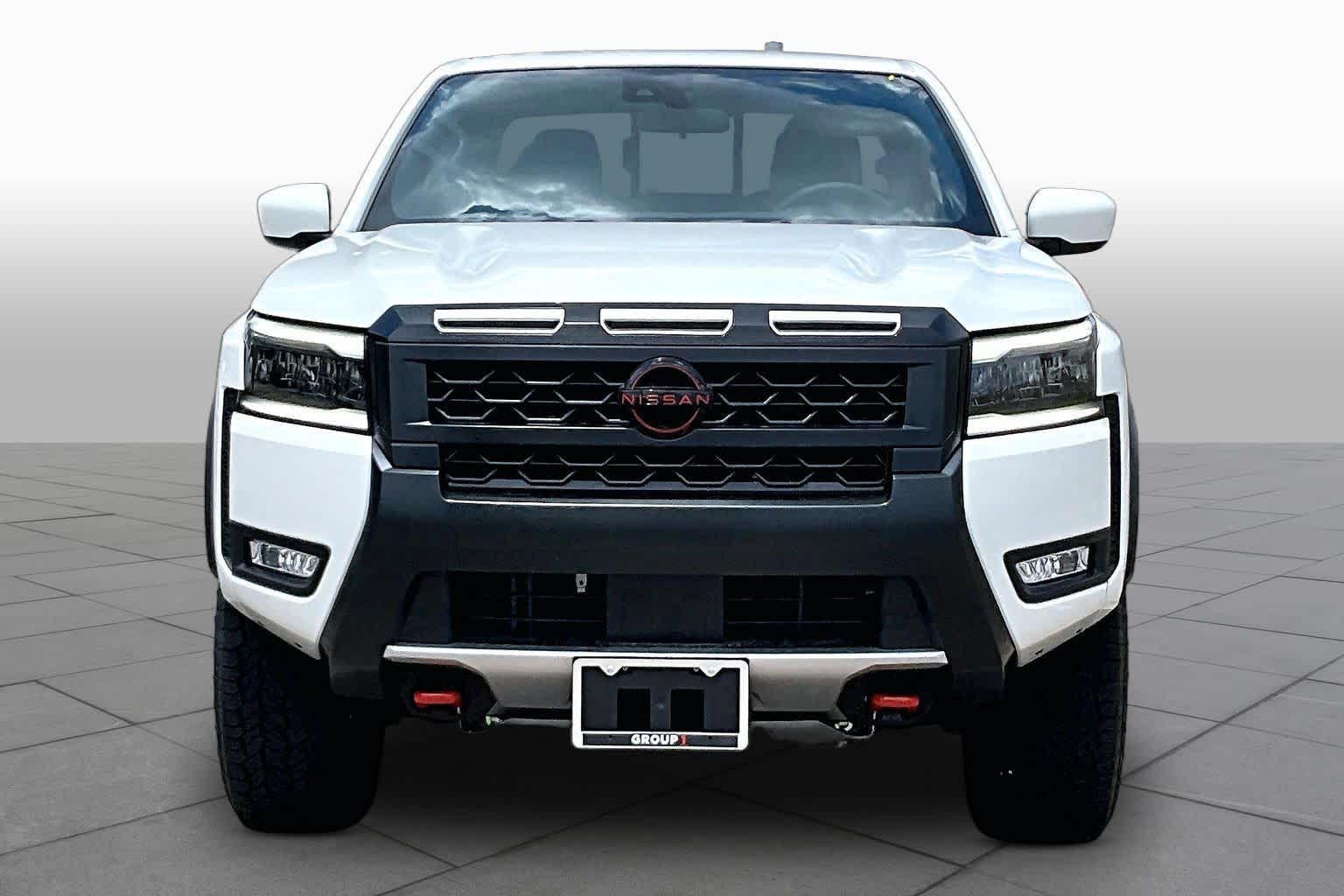 2026 Nissan Frontier PRO-4X Glacier White at Sterling McCall Nissan