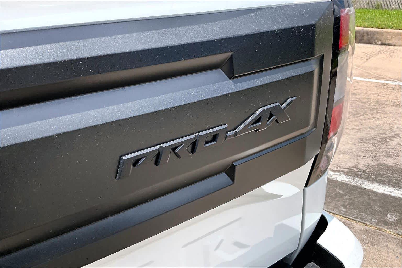 2026 Nissan Frontier PRO-4X Glacier White at Sterling McCall Nissan