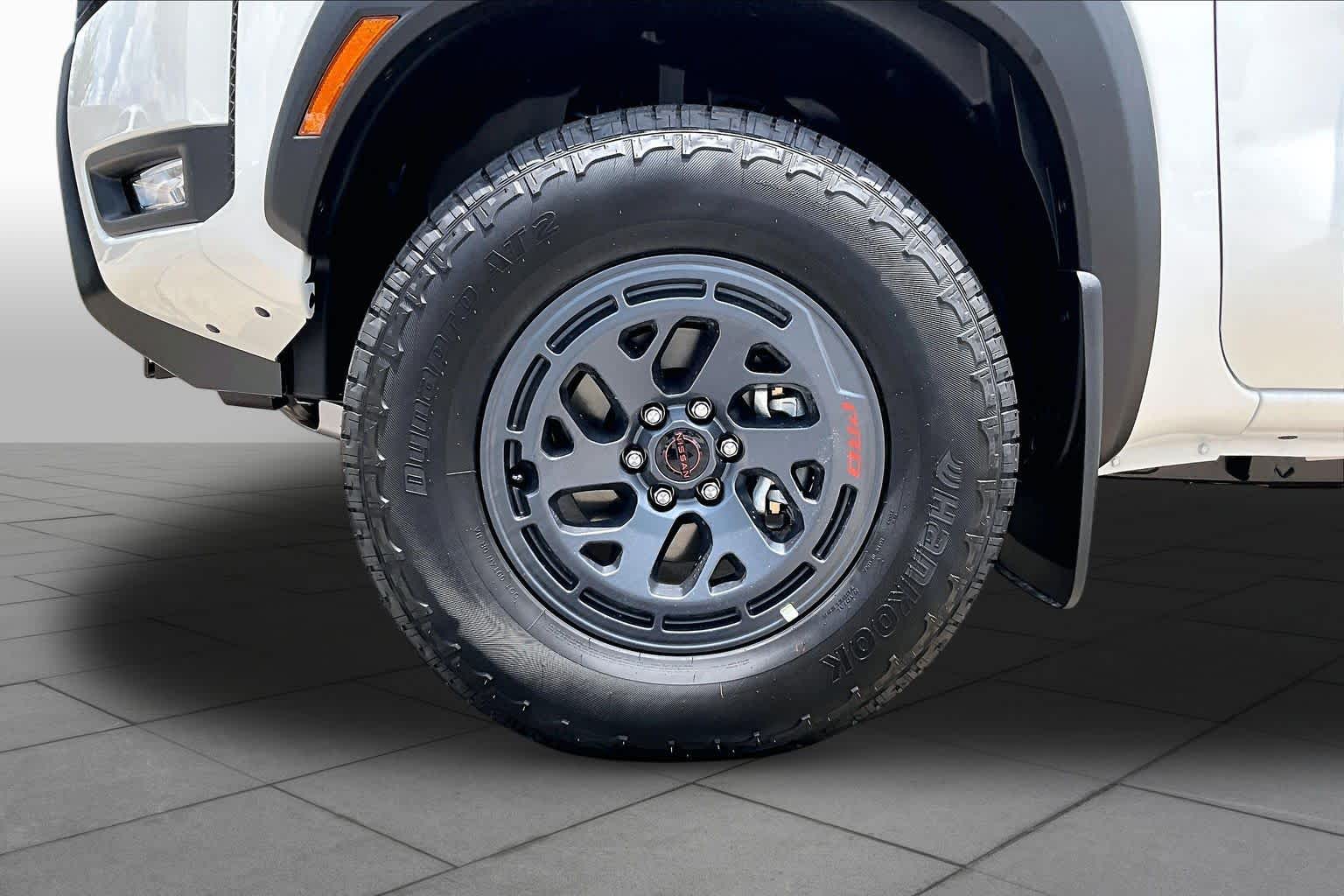2026 Nissan Frontier PRO-4X Glacier White at Sterling McCall Nissan
