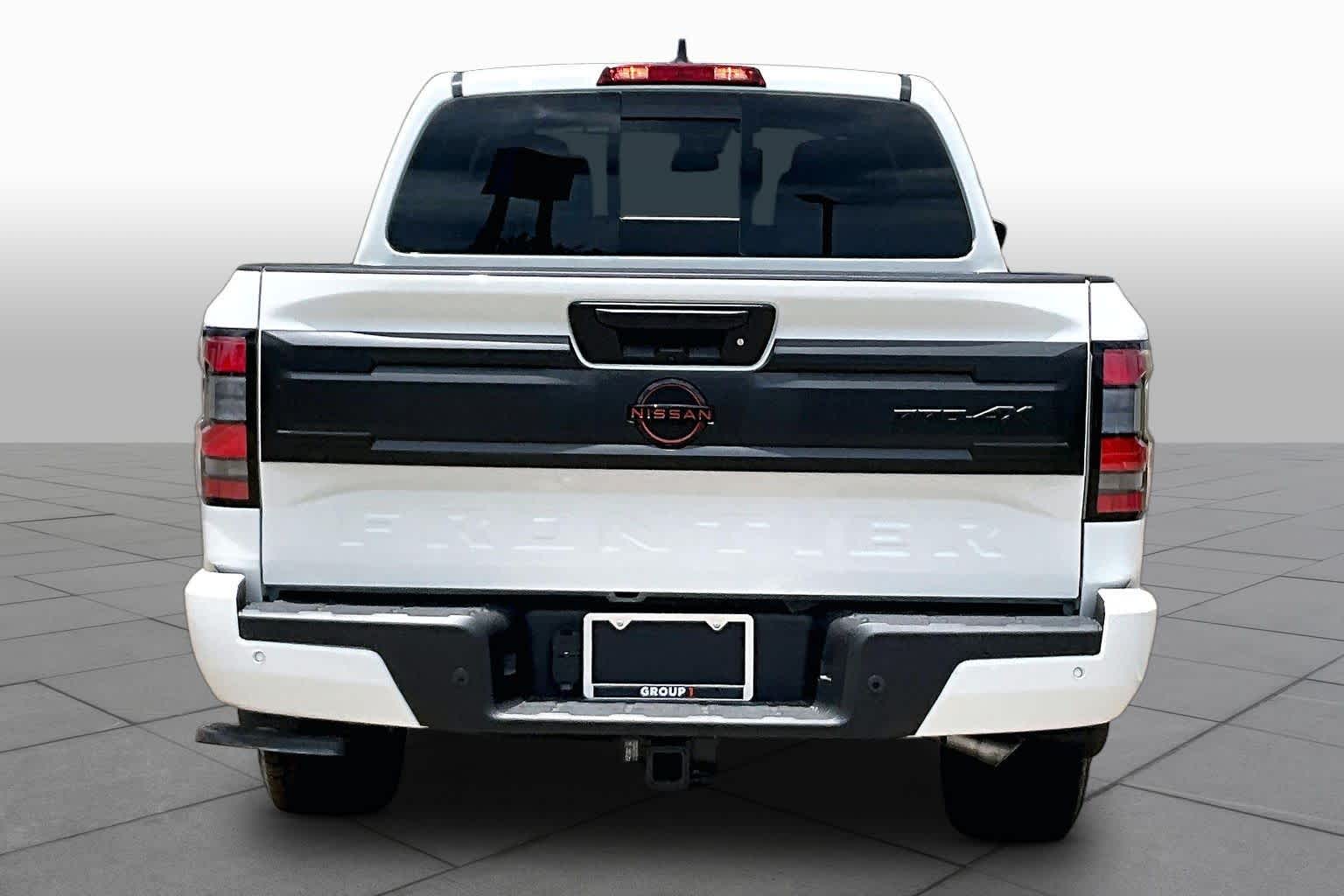2026 Nissan Frontier PRO-4X Glacier White at Sterling McCall Nissan