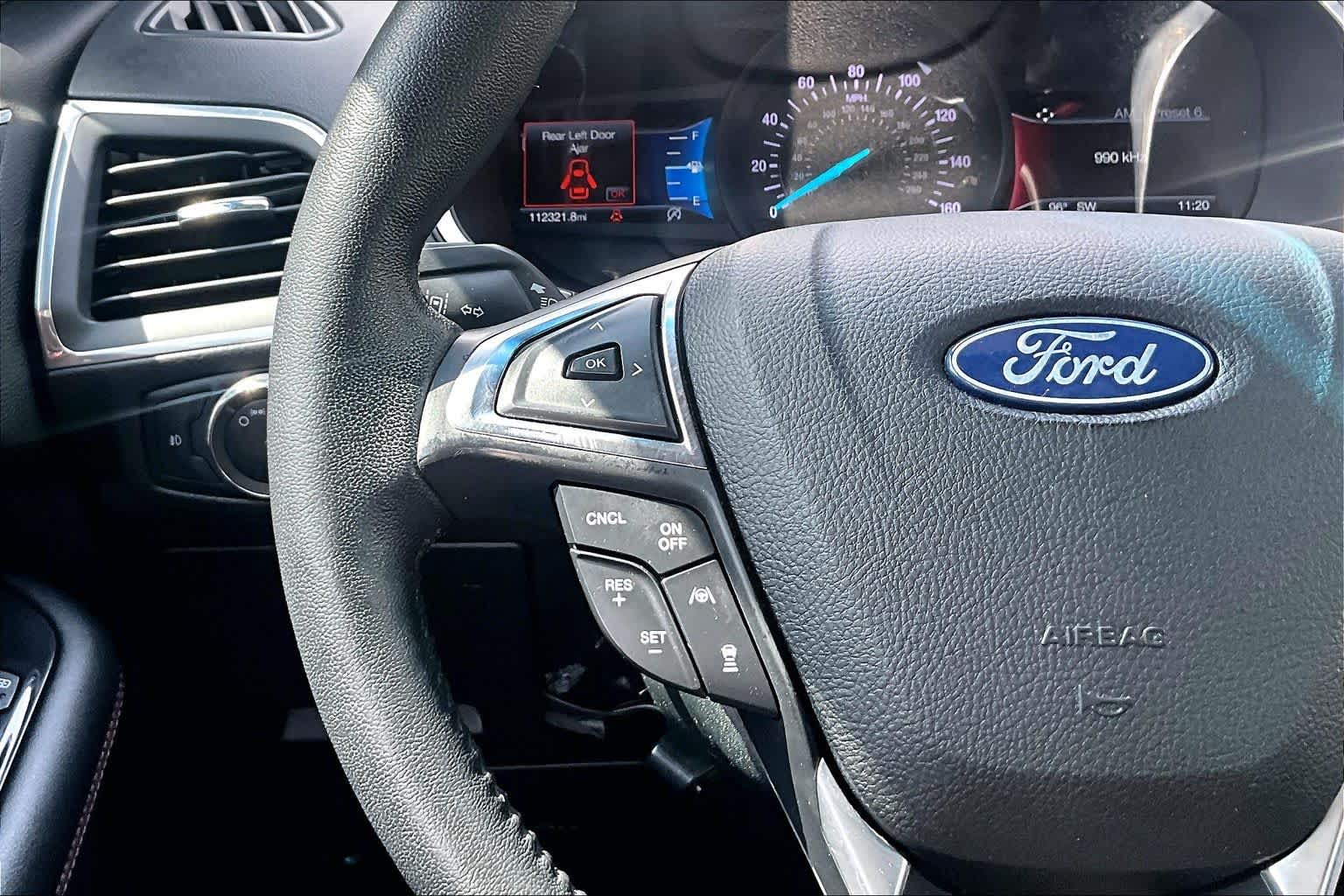 2020 Ford Edge Titanium Star White Metallic Tri-Coat at Tomball Ford