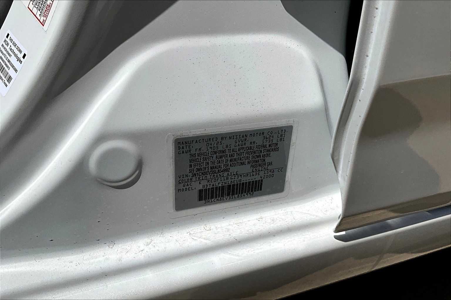 2025 Nissan Versa SV Aspen White Tricoat at AutoNation USA Katy