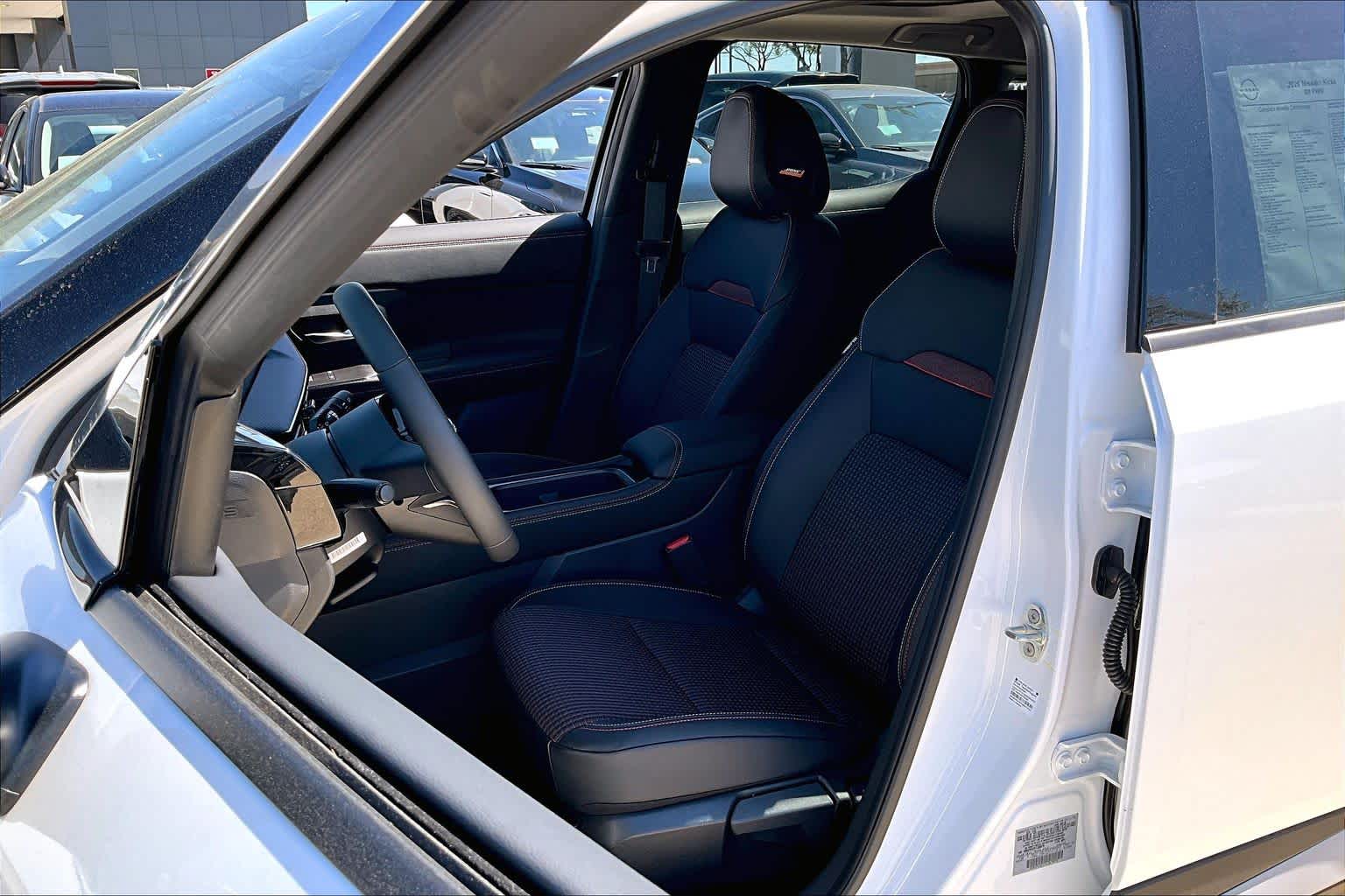 2026 Nissan Kicks SR Aspen White Tricoat/Super Black at Sterling McCall Nissan