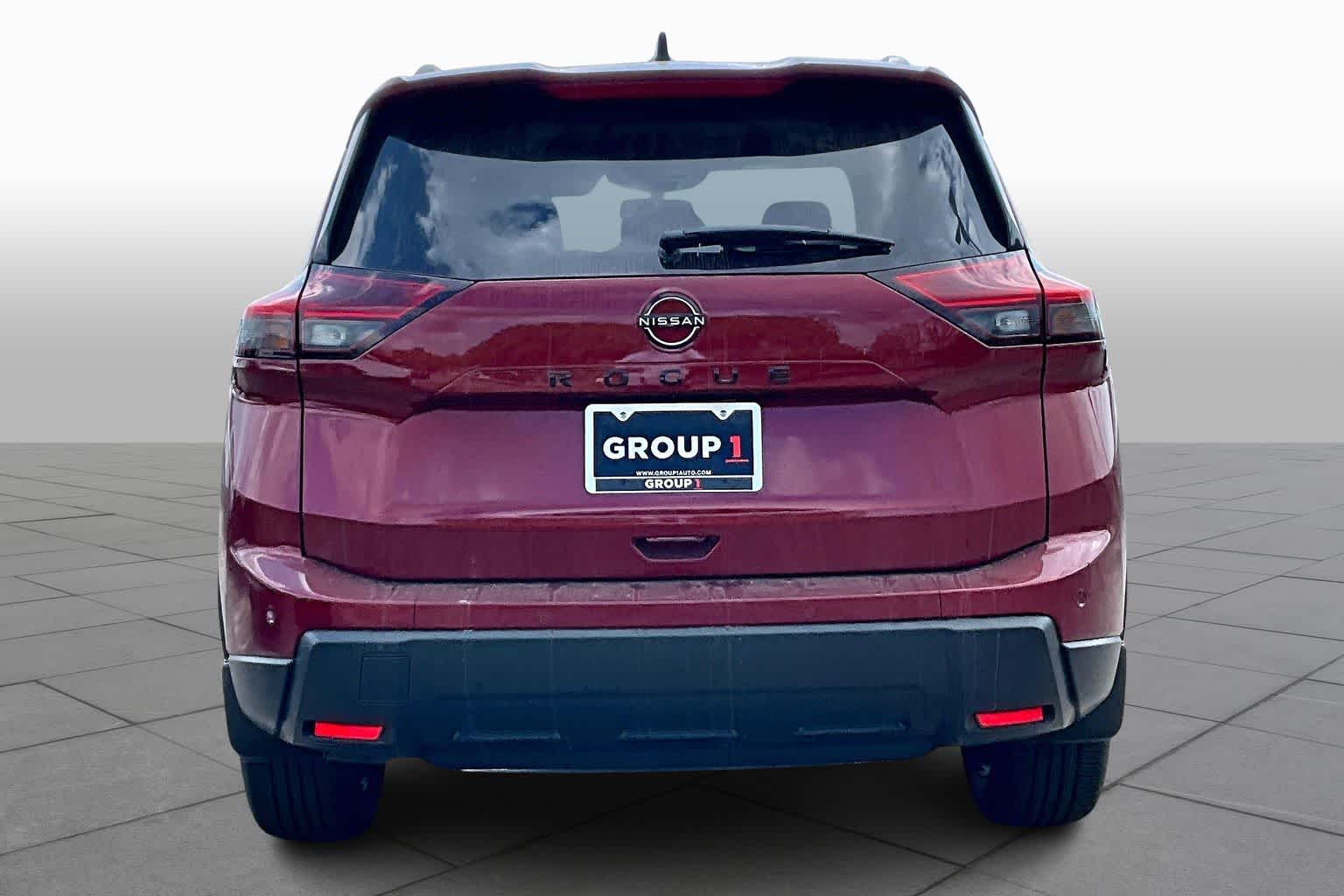 2026 Nissan Rogue Dark Armor Scarlet Ember Tintcoat at Sterling McCall Nissan