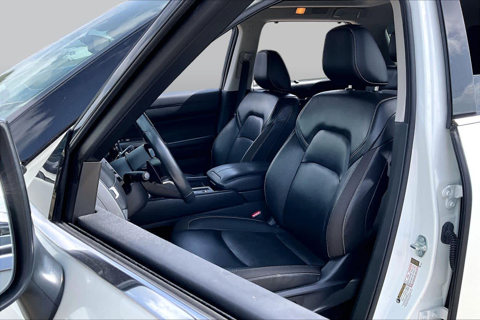 2023 Nissan Pathfinder SL Pearl White Tricoat/Super Black at Lone Star Chevrolet