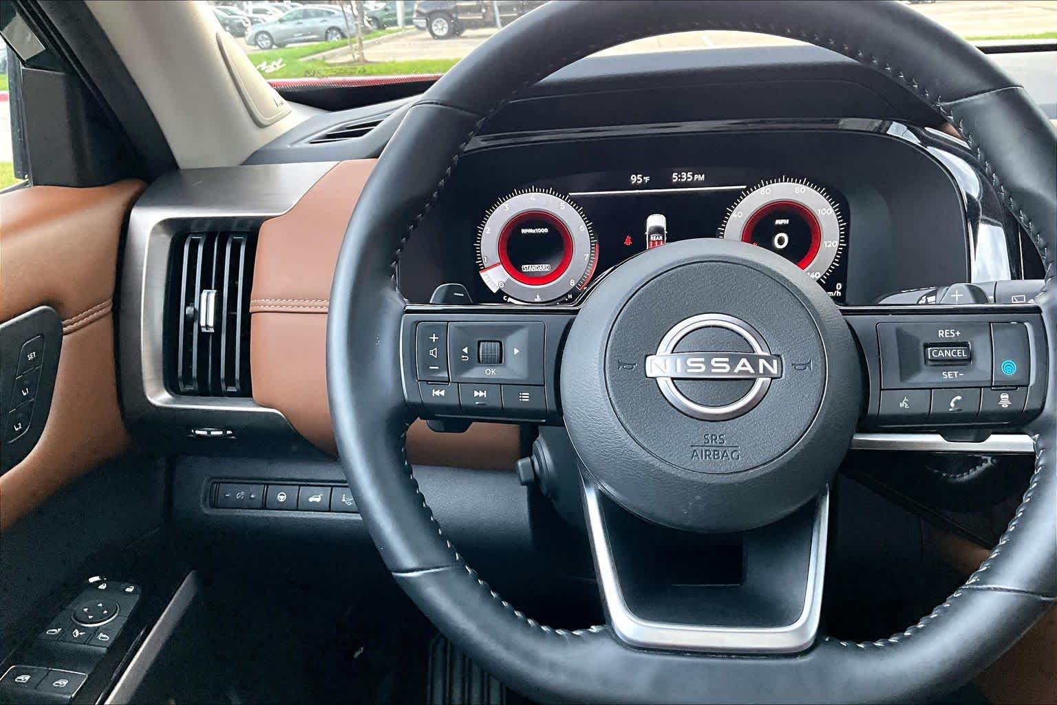 2025 Nissan Pathfinder Platinum Obsidian Green Pearl at Sterling McCall Nissan