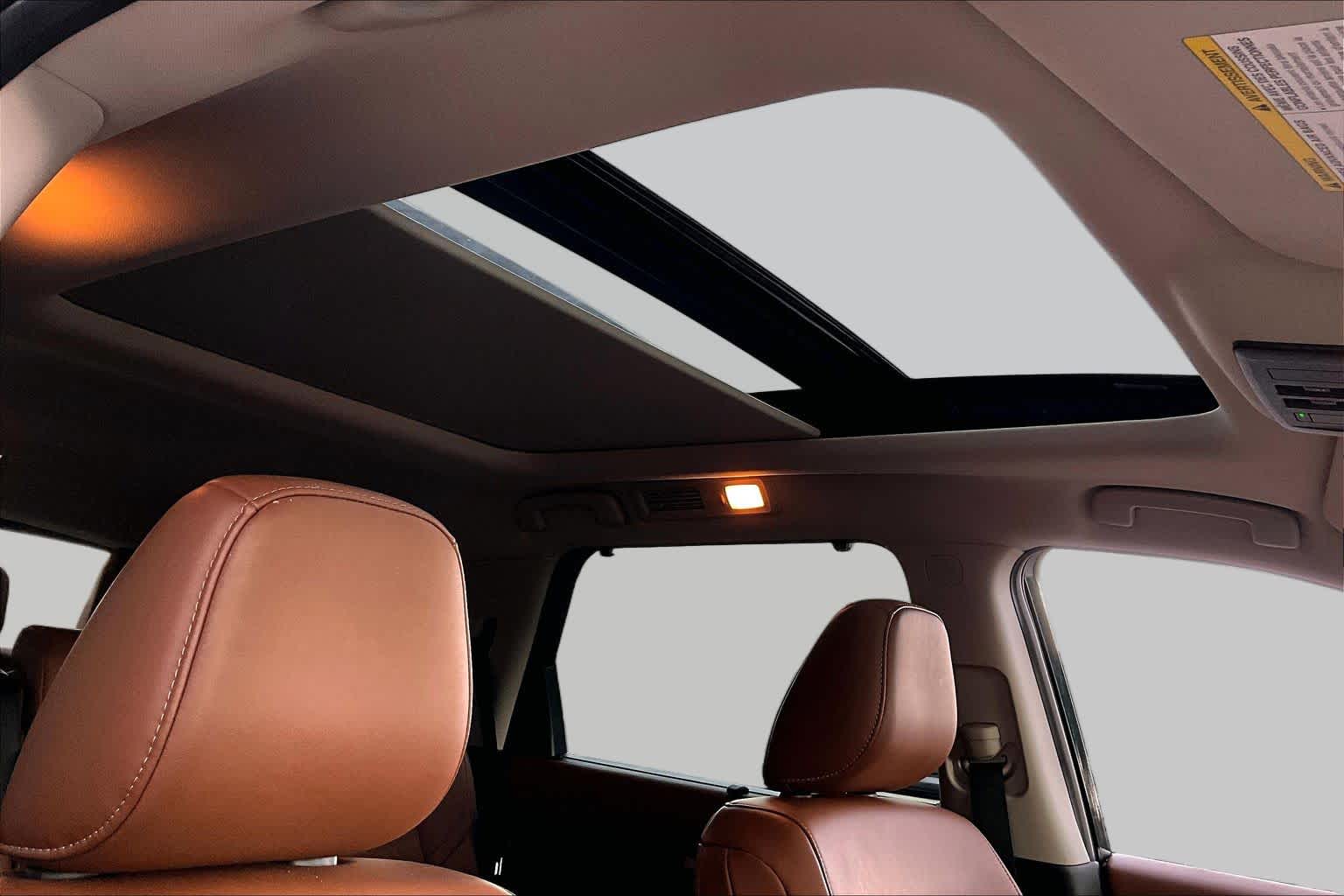 2025 Nissan Pathfinder Platinum Obsidian Green Pearl at Sterling McCall Nissan