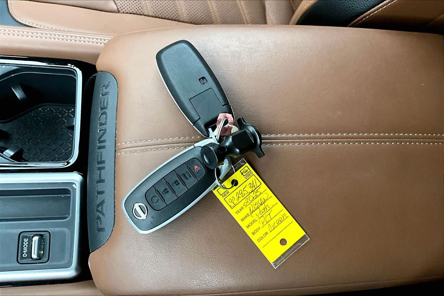 2025 Nissan Pathfinder Platinum Obsidian Green Pearl at Sterling McCall Nissan